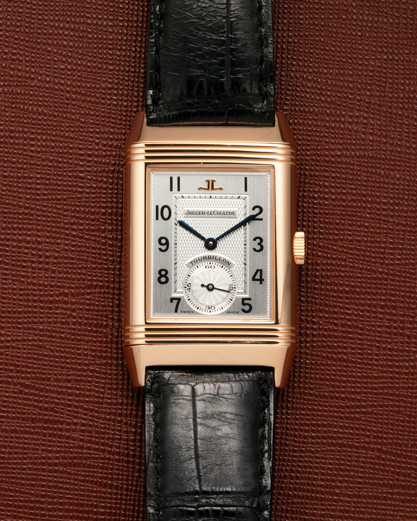 Brand: Jaeger LeCoultre
Year: 1990s
Model: Reverso Tourbillon, Limited to 500 pieces
Reference: 270.2.68
Material: 18-carat Rose Gold
Movement: Jaeger LeCoultre Cal. 828, Manual-Winding
Case Dimensions: 42mm (Including Lugs) x 26mm x 10mm
Lug Width: 19mm
Strap: Jaeger LeCoultre Black Alligator Leather Strap with Signed 18-carat Rose Gold Deployant Clasp
