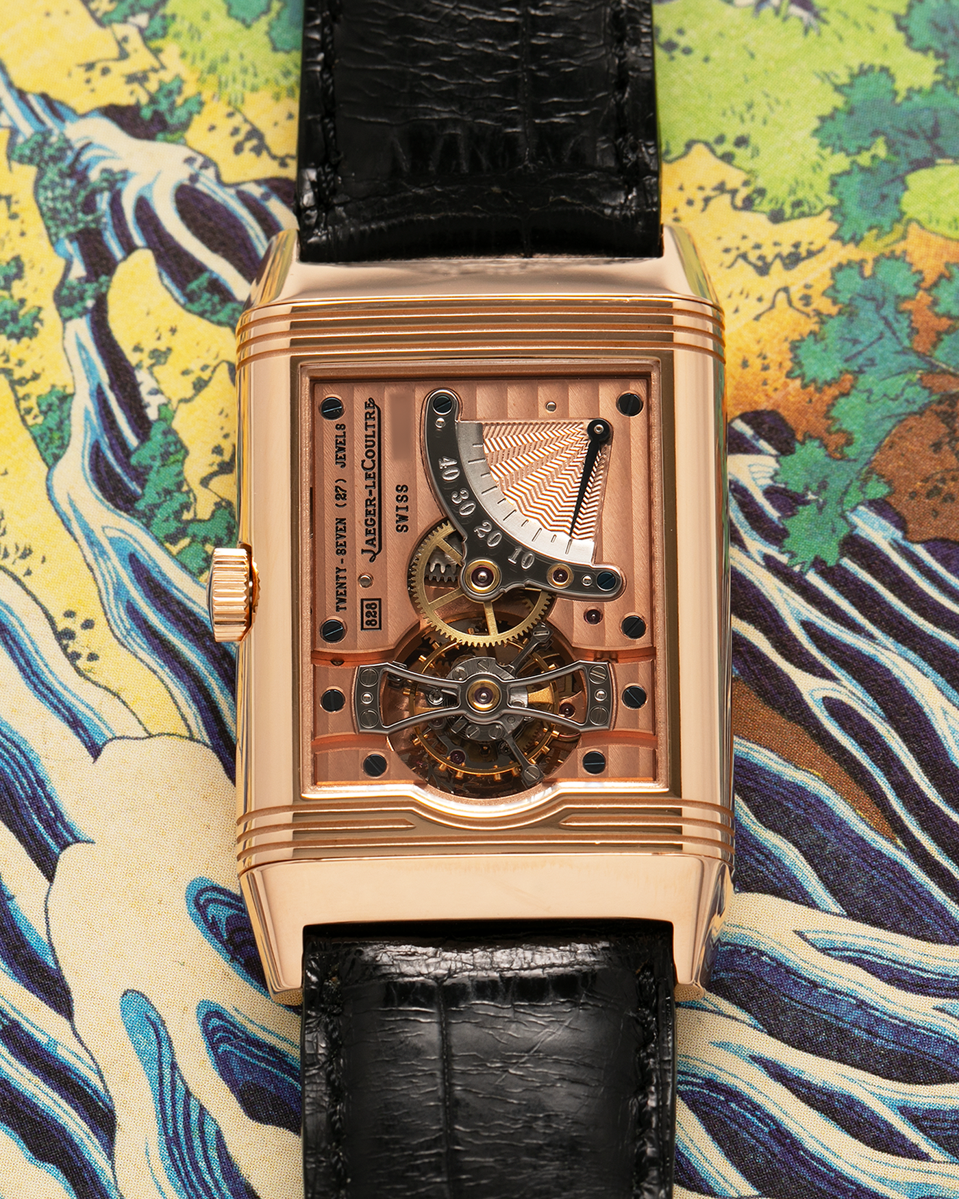 Brand: Jaeger LeCoultre
Year: 1990s
Model: Reverso Tourbillon, Limited to 500 pieces
Reference: 270.2.68
Material: 18-carat Rose Gold
Movement: Jaeger LeCoultre Cal. 828, Manual-Winding
Case Dimensions: 42mm (Including Lugs) x 26mm x 10mm
Lug Width: 19mm
Strap: Jaeger LeCoultre Black Alligator Leather Strap with Signed 18-carat Rose Gold Deployant Clasp