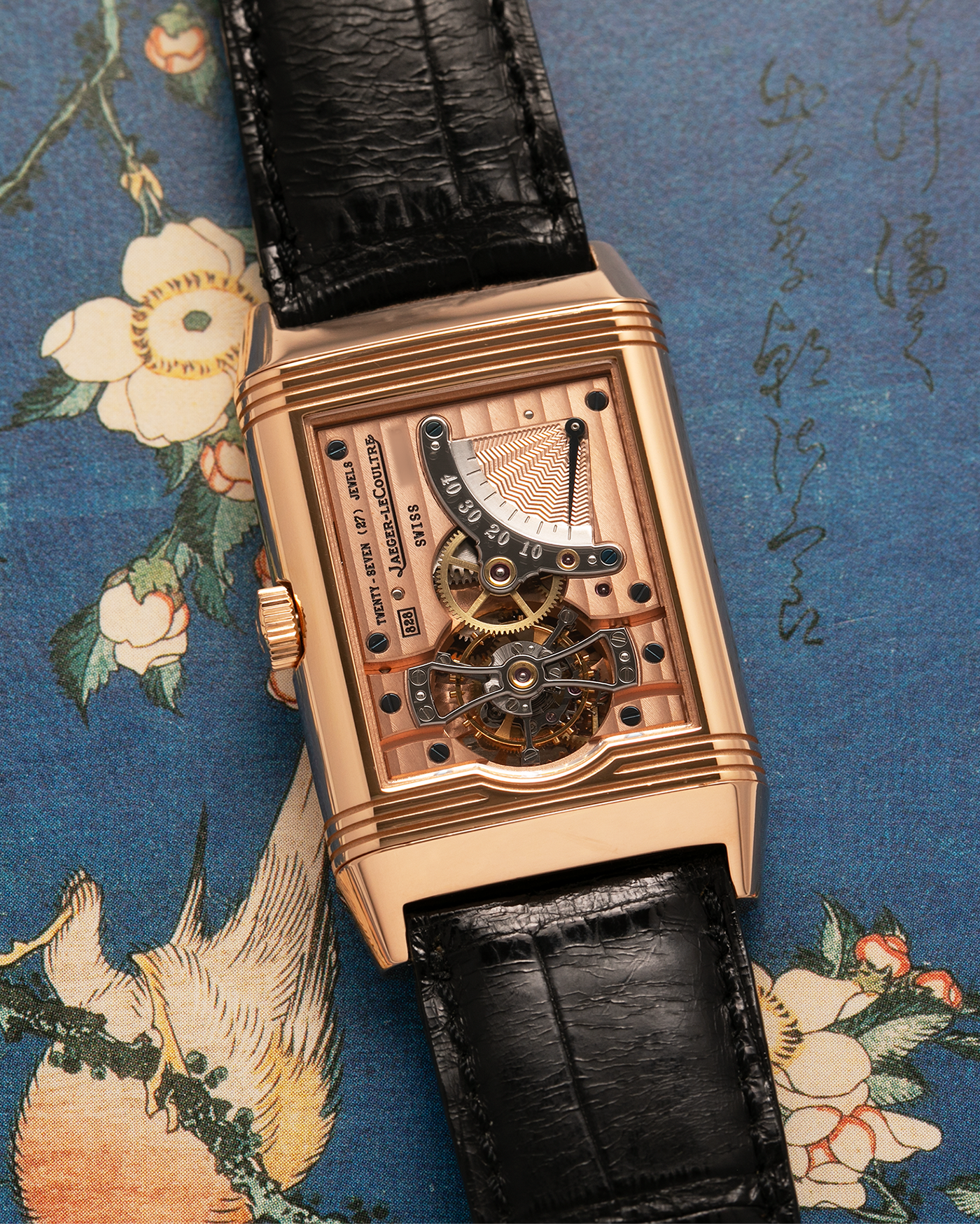 Brand: Jaeger LeCoultre
Year: 1990s
Model: Reverso Tourbillon, Limited to 500 pieces
Reference: 270.2.68
Material: 18-carat Rose Gold
Movement: Jaeger LeCoultre Cal. 828, Manual-Winding
Case Dimensions: 42mm (Including Lugs) x 26mm x 10mm
Lug Width: 19mm
Strap: Jaeger LeCoultre Black Alligator Leather Strap with Signed 18-carat Rose Gold Deployant Clasp