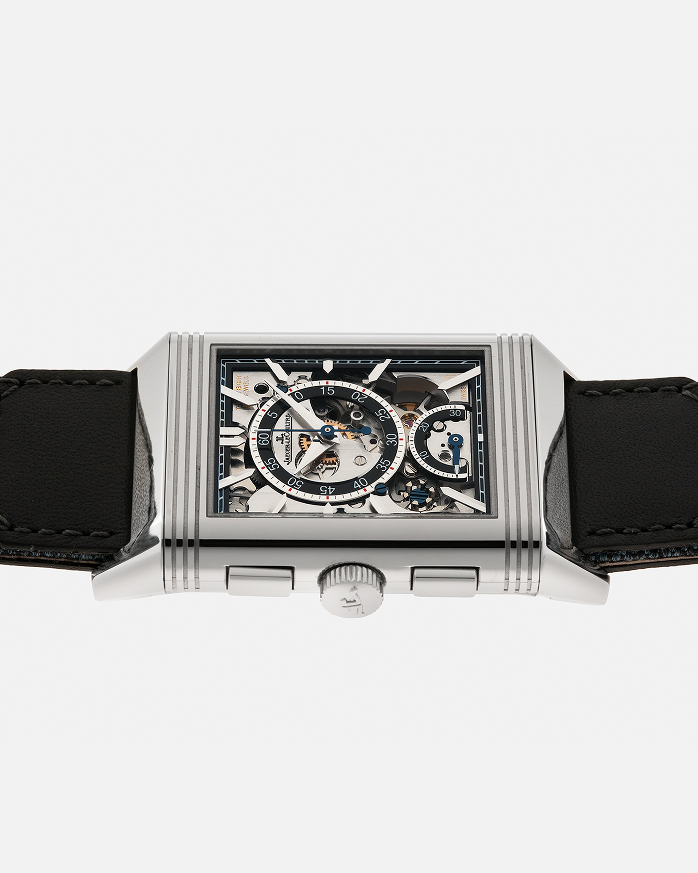 Brand: Jaeger LeCoultre
Year: 2024
Model: Q389848J, Reverso Tribute Chronograph
Reference Number: 216.8.S0
Material: Stainless Steel
Movement: Jaeger LeCoultre Cal. 860, Manual-Winding
Case Diameter:  49.9mm (Including Lugs) x 29.9mm x 11.14mm
Lug Width: 20mm
Straps: Jaeger LeCoultre Casa Fagliano Calf Leather Strap with Signed Stainless Steel Deployant Clasp, with extra  Jaeger LeCoultre Blue Canvas Strap