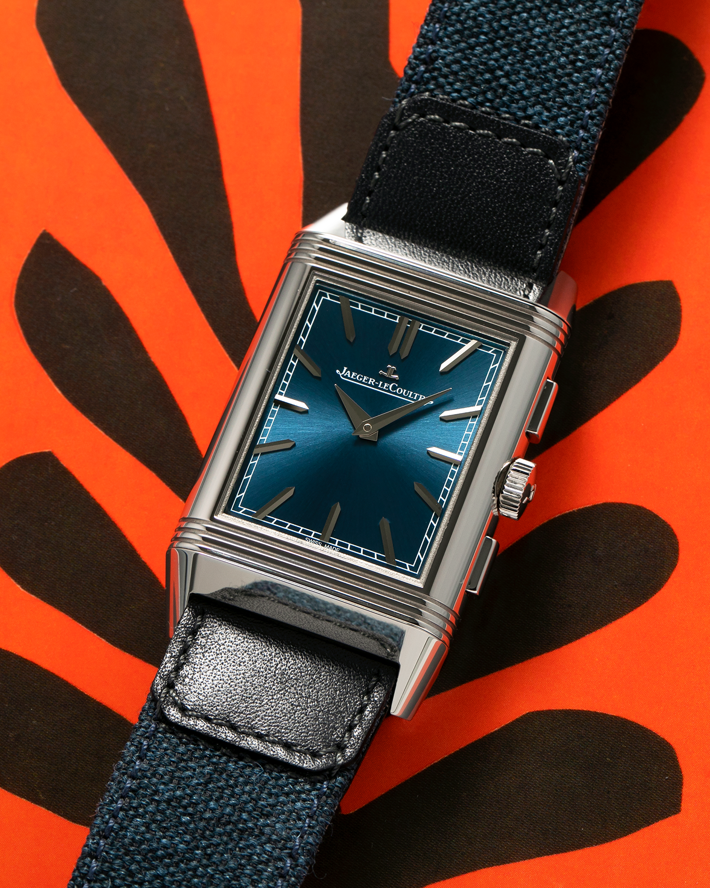 Brand: Jaeger LeCoultre
Year: 2024
Model: Q389848J, Reverso Tribute Chronograph
Reference Number: 216.8.S0
Material: Stainless Steel
Movement: Jaeger LeCoultre Cal. 860, Manual-Winding
Case Diameter:  49.9mm (Including Lugs) x 29.9mm x 11.14mm
Lug Width: 20mm
Straps: Jaeger LeCoultre Casa Fagliano Calf Leather Strap with Signed Stainless Steel Deployant Clasp, with extra  Jaeger LeCoultre Blue Canvas Strap