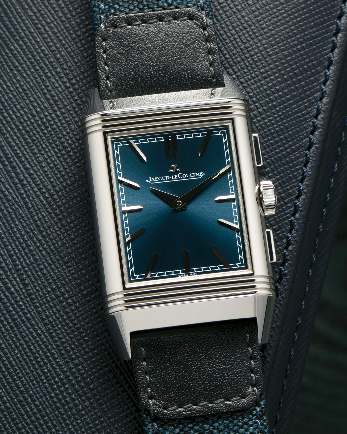 Brand: Jaeger LeCoultre
Year: 2024
Model: Q389848J, Reverso Tribute Chronograph
Reference Number: 216.8.S0
Material: Stainless Steel
Movement: Jaeger LeCoultre Cal. 860, Manual-Winding
Case Diameter:  49.9mm (Including Lugs) x 29.9mm x 11.14mm
Lug Width: 20mm
Straps: Jaeger LeCoultre Casa Fagliano Calf Leather Strap with Signed Stainless Steel Deployant Clasp, with extra  Jaeger LeCoultre Blue Canvas Strap
