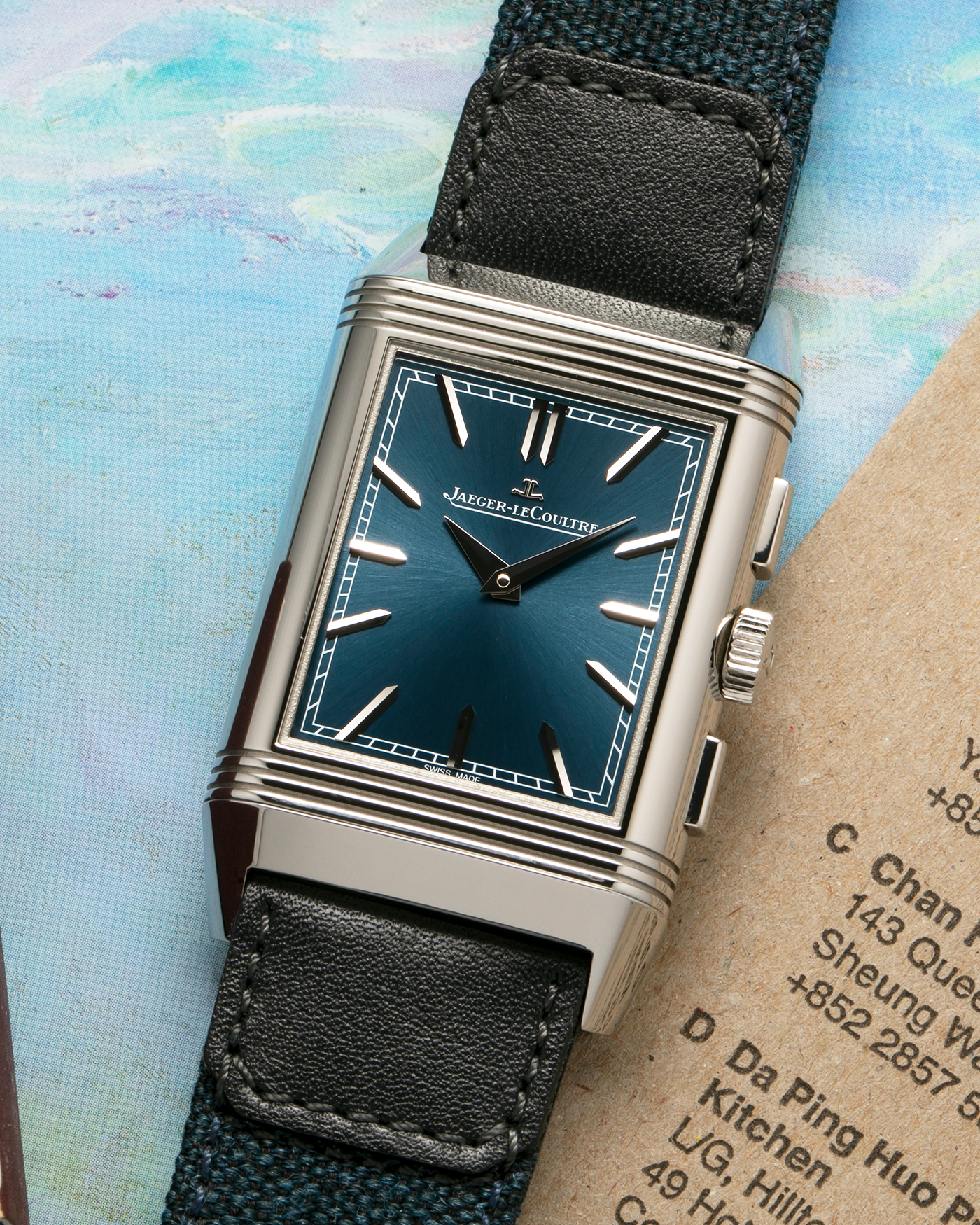 Brand: Jaeger LeCoultre
Year: 2024
Model: Q389848J, Reverso Tribute Chronograph
Reference Number: 216.8.S0
Material: Stainless Steel
Movement: Jaeger LeCoultre Cal. 860, Manual-Winding
Case Diameter:  49.9mm (Including Lugs) x 29.9mm x 11.14mm
Lug Width: 20mm
Straps: Jaeger LeCoultre Casa Fagliano Calf Leather Strap with Signed Stainless Steel Deployant Clasp, with extra  Jaeger LeCoultre Blue Canvas Strap