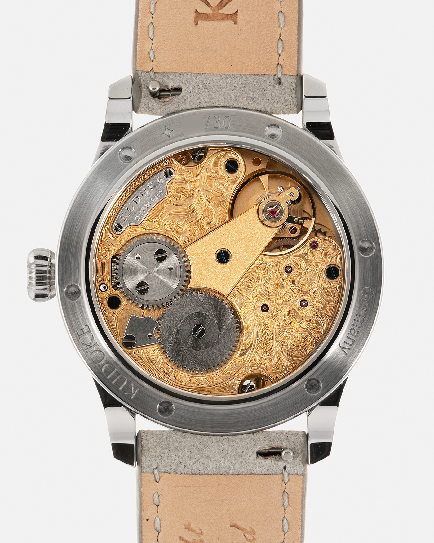 Brand: Kudoke Year: 2022 Model: Kudoke 2 ‘British Heritage’, Limited Edition of 30 pieces Material: Stainless Steel Movement: Kudoke Kaliber 1-24H, Manual-Winding Case Diameter: 39mm Lug Width: 20mm Strap: Kudoke Grey Alcantara Leather Strap with Signed Stainless Steel Tang Buckle, additional Dark Blue Alcantara Leather Strap