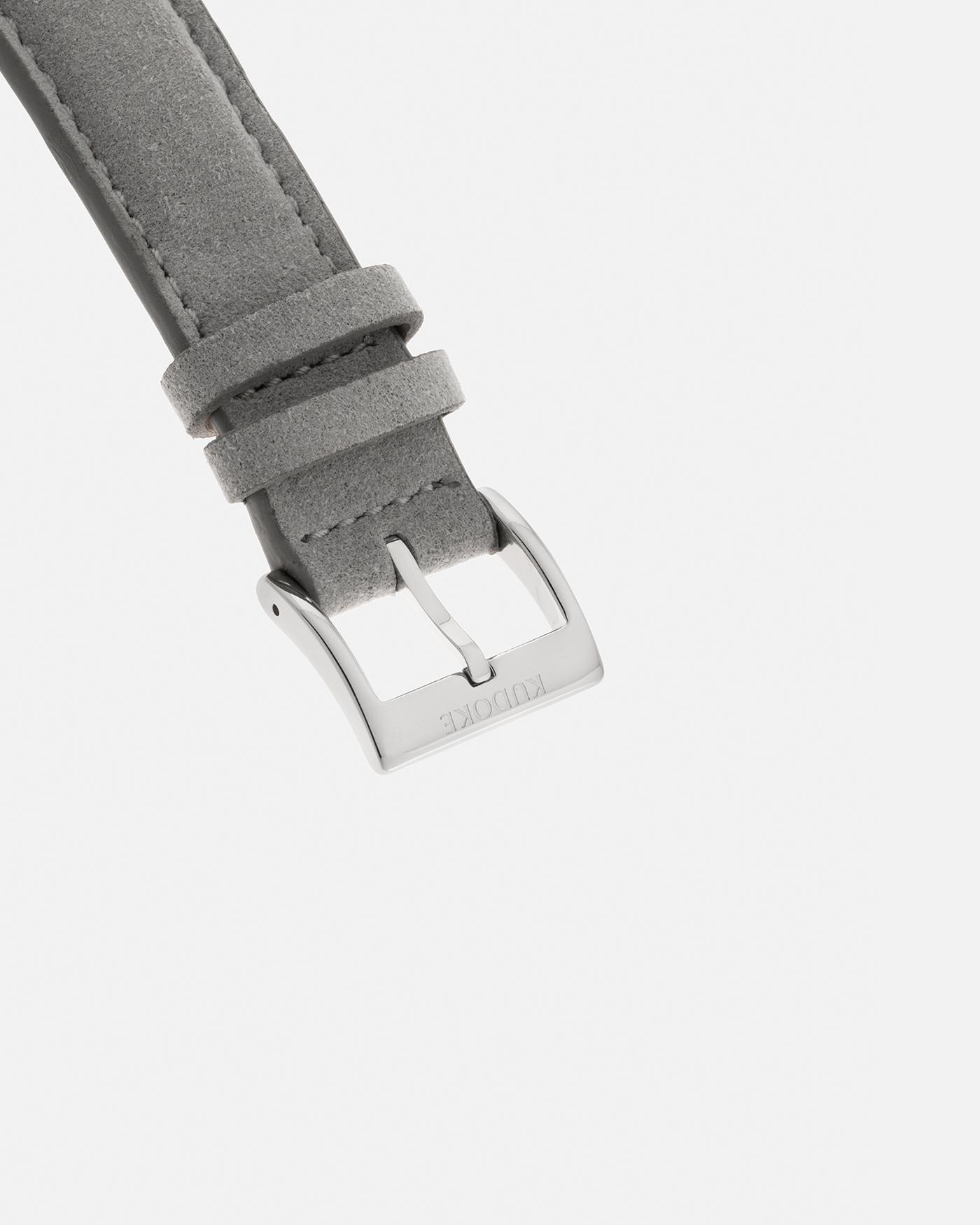 Brand: Kudoke Year: 2022 Model: Kudoke 2 ‘British Heritage’, Limited Edition of 30 pieces Material: Stainless Steel Movement: Kudoke Kaliber 1-24H, Manual-Winding Case Diameter: 39mm Lug Width: 20mm Strap: Kudoke Grey Alcantara Leather Strap with Signed Stainless Steel Tang Buckle, additional Dark Blue Alcantara Leather Strap