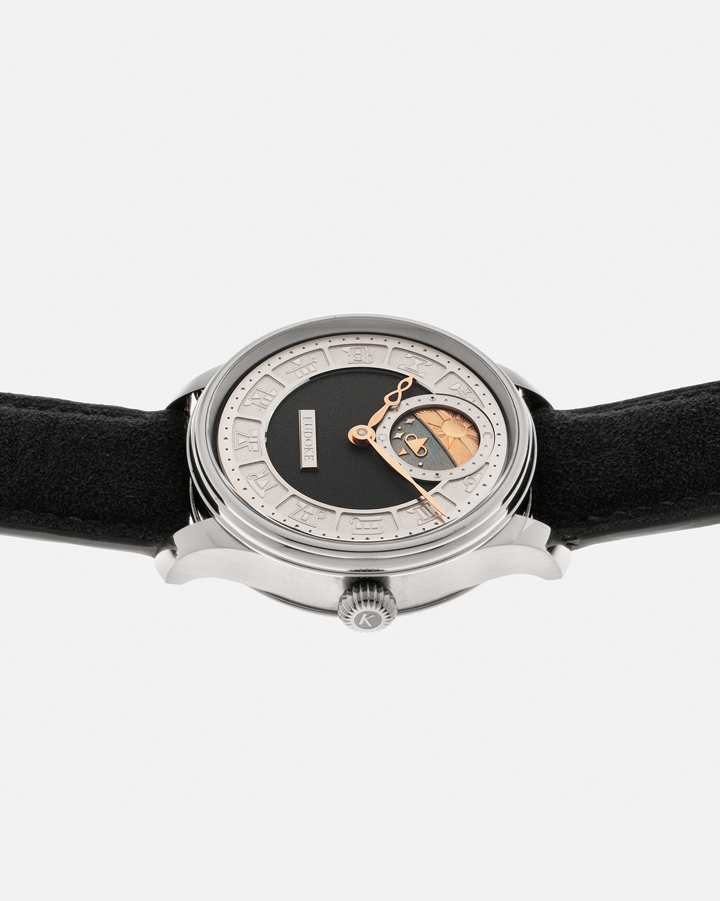 Brand: Kudoke Year: 2021 Model: Kudoke 2 ‘Zodiac’ x SJX, Limited Edition of 21 pieces (Only 12 Full Titanium Examples) Material: Grade 5 Titanium Movement: Kudoke Kaliber 1-24H, Manual-Winding Case Dimensions: 39mm x 10.7mm Lug Width: 20mm Strap: Kudoke Alcantara Grey Strap with Signed Titanium Tang Buckle
