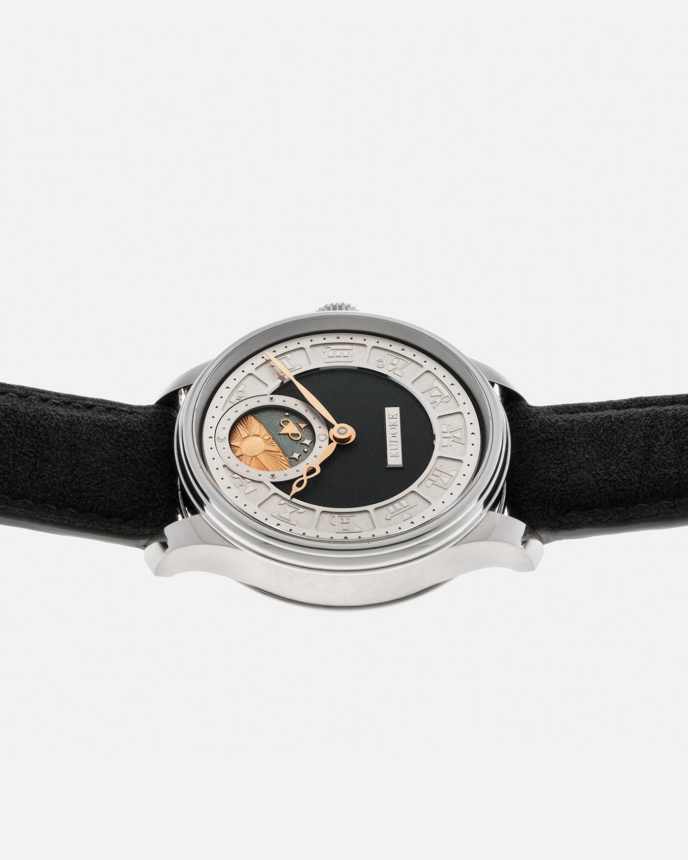 Brand: Kudoke Year: 2021 Model: Kudoke 2 ‘Zodiac’ x SJX, Limited Edition of 21 pieces (Only 12 Full Titanium Examples) Material: Grade 5 Titanium Movement: Kudoke Kaliber 1-24H, Manual-Winding Case Dimensions: 39mm x 10.7mm Lug Width: 20mm Strap: Kudoke Alcantara Grey Strap with Signed Titanium Tang Buckle