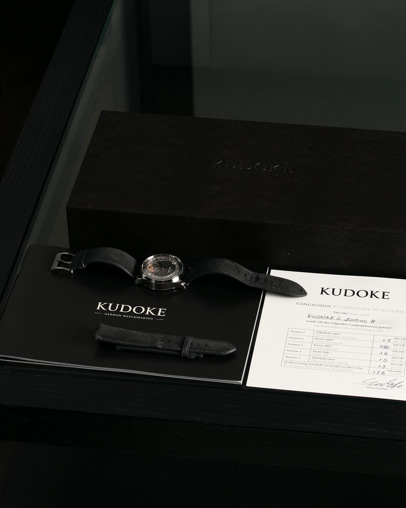 Brand: Kudoke Year: 2021 Model: Kudoke 2 ‘Zodiac’ x SJX, Limited Edition of 21 pieces (Only 12 Full Titanium Examples) Material: Grade 5 Titanium Movement: Kudoke Kaliber 1-24H, Manual-Winding Case Dimensions: 39mm x 10.7mm Lug Width: 20mm Strap: Kudoke Alcantara Grey Strap with Signed Titanium Tang Buckle