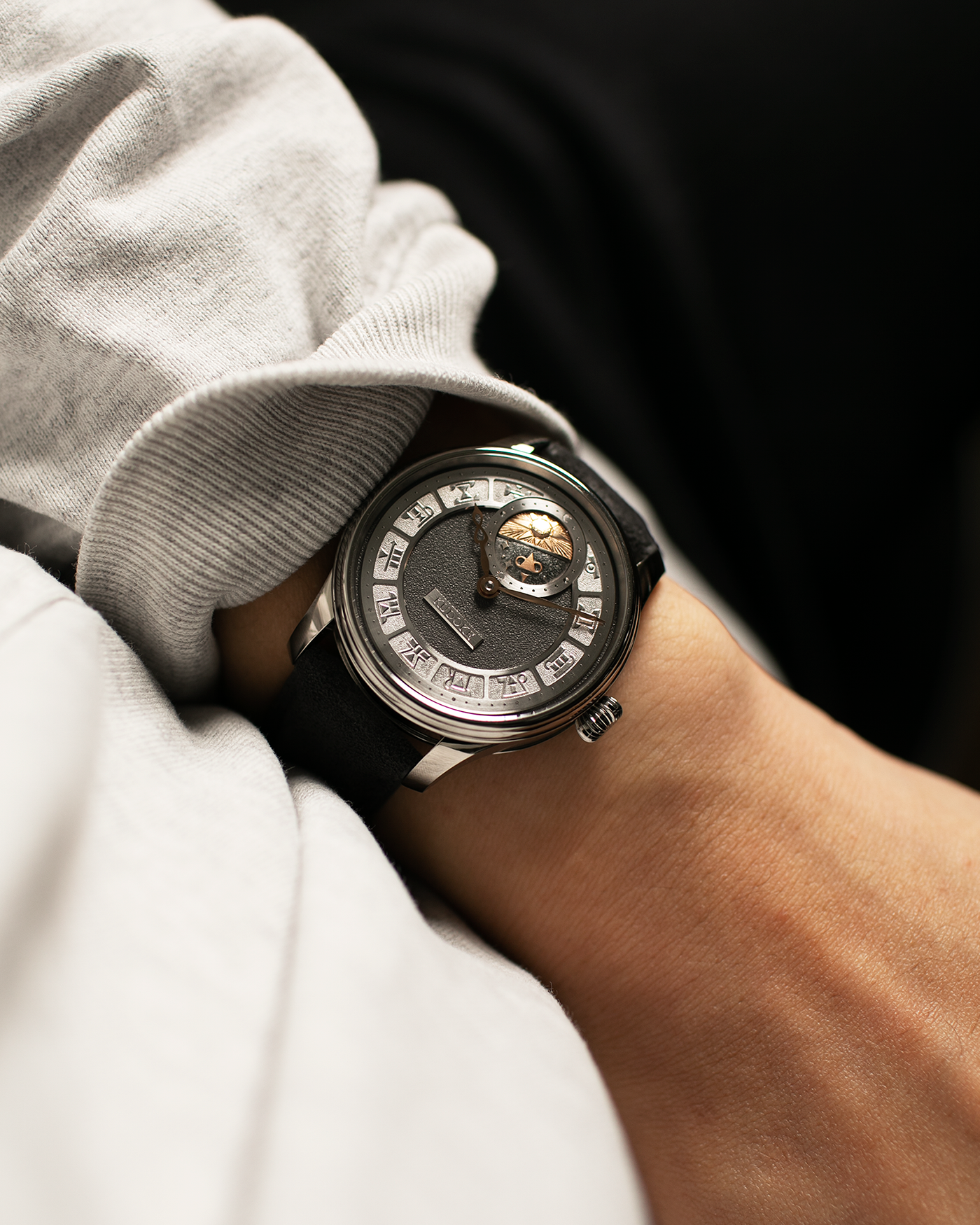 Brand: Kudoke Year: 2021 Model: Kudoke 2 ‘Zodiac’ x SJX, Limited Edition of 21 pieces (Only 12 Full Titanium Examples) Material: Grade 5 Titanium Movement: Kudoke Kaliber 1-24H, Manual-Winding Case Dimensions: 39mm x 10.7mm Lug Width: 20mm Strap: Kudoke Alcantara Grey Strap with Signed Titanium Tang Buckle