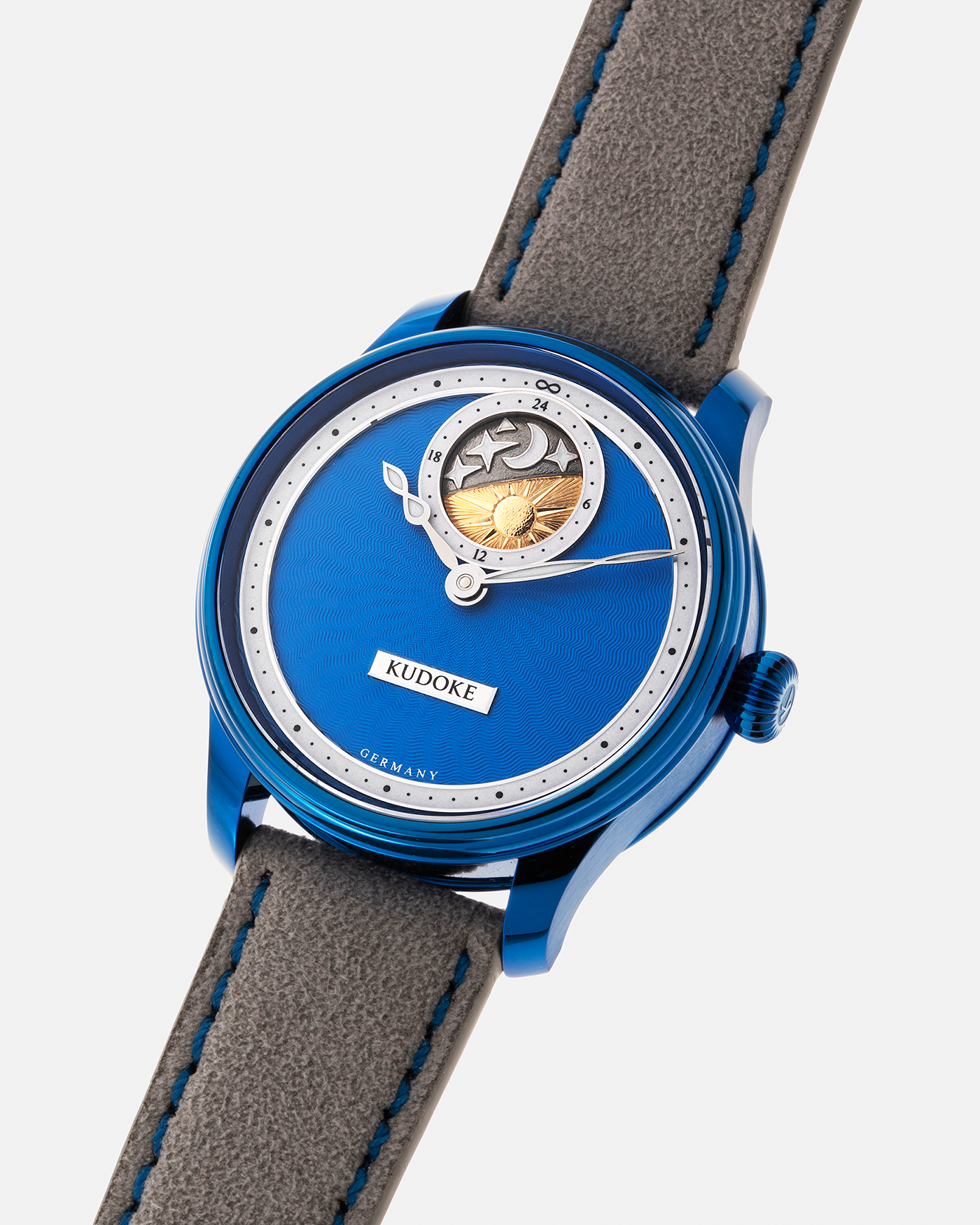 Brand: Kudoke Year: 2022 Model: Kudoke 2 ‘Starry Night’ Grail Watch 8, Limited Edition of 30 pieces Material: Grade 5 Titanium with CVD Blue Finish Movement: In-house Kaliber 1-24H, Manual-Winding Case Diameter: 39mm Strap: Grey Alcantara with Bovine Calf Lining and Blue Stitching with Signed CVD Blue Grade 5 Titanium Tang Buckle, Additional Delugs Navy CTS Rubber Strap, and Delugs Denim Bable Signature Strap