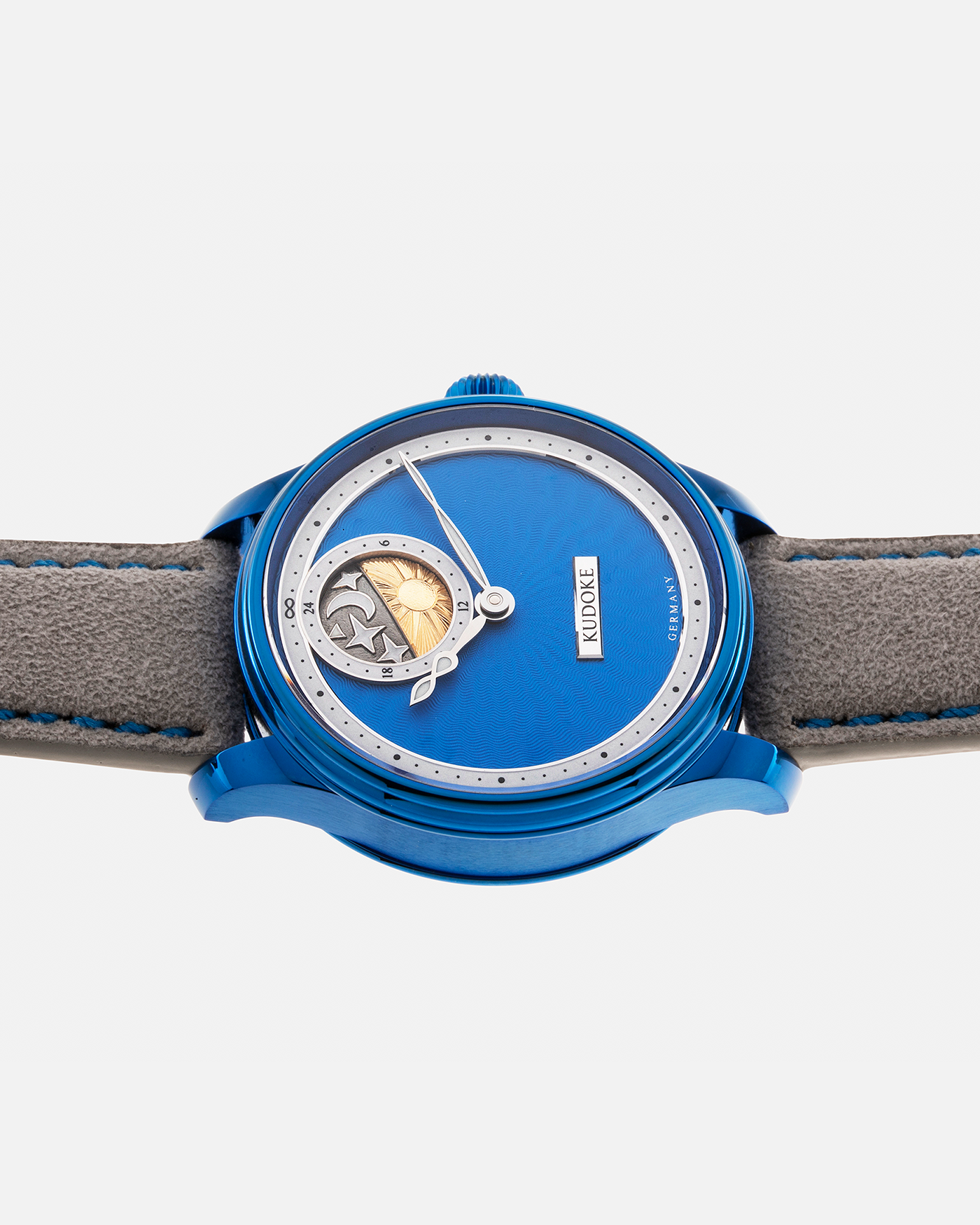Brand: Kudoke Year: 2022 Model: Kudoke 2 ‘Starry Night’ Grail Watch 8, Limited Edition of 30 pieces Material: Grade 5 Titanium with CVD Blue Finish Movement: In-house Kaliber 1-24H, Manual-Winding Case Diameter: 39mm Strap: Grey Alcantara with Bovine Calf Lining and Blue Stitching with Signed CVD Blue Grade 5 Titanium Tang Buckle, Additional Delugs Navy CTS Rubber Strap, and Delugs Denim Bable Signature Strap