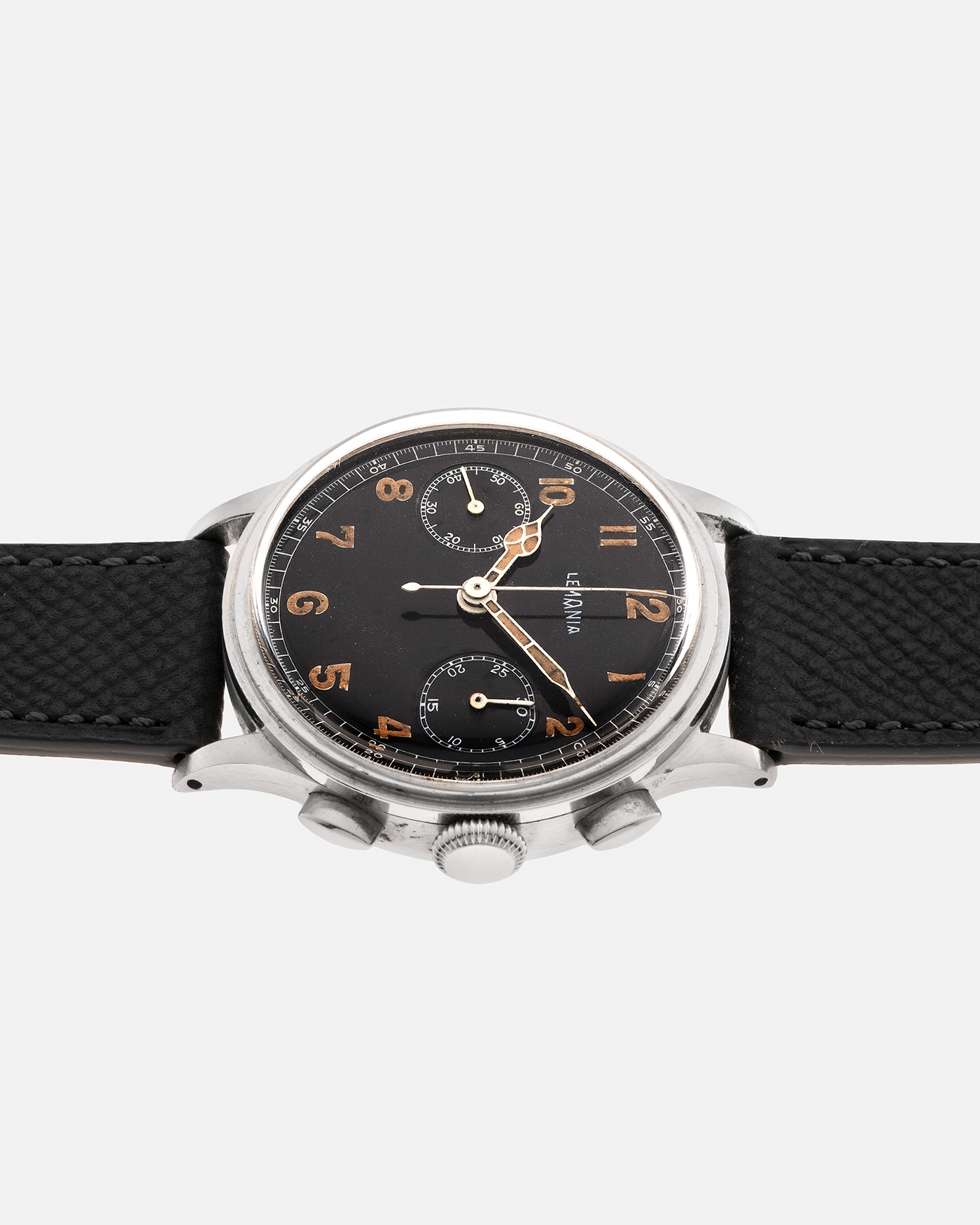 Brand: Lemania Year: 1940’s Model: 15TL Material: Stainless Steel Movement: Lemania Cal. 15TL, Manual-Winding Case Diameter: 38mm Strap: Molequin Anthracite Grey Textured Calf Leather Strap