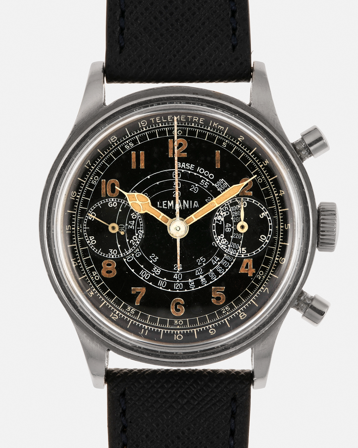 Brand: Lemania
Year: 1940’s
Model: 15TL
Material: Stainless Steel
Movement: Lemania Cal. 15TL, Manual-Winding
Case Dimensions: 38mm x 14mm (Lug-to-Lug 45.25mm)
Lug Width: 20mm
Strap: Nostime Dark Navy Textured Calf Leather Strap