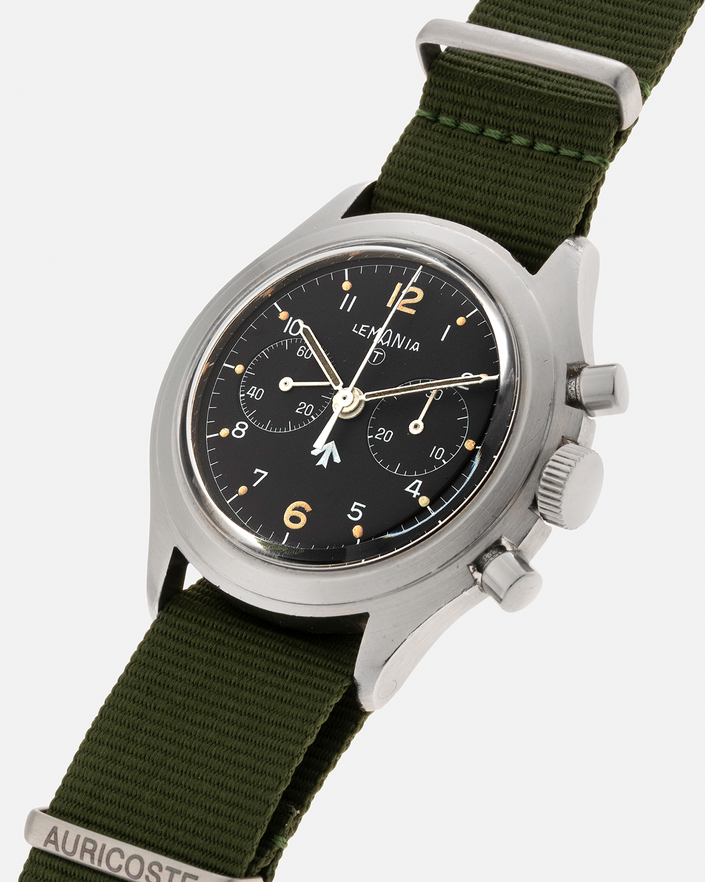Brand: Lemania Year: 1975 Model: ‘Double Pusher’ Royal Navy Chronograph, Estimated 500 pieces only Reference Number: 818 Material: Stainless Steel Movement: Lemania 2220, Manual-Winding Case Diameter: 40mm Lug Width: 20mm Strap: Auricoste Military Green NATO Strap