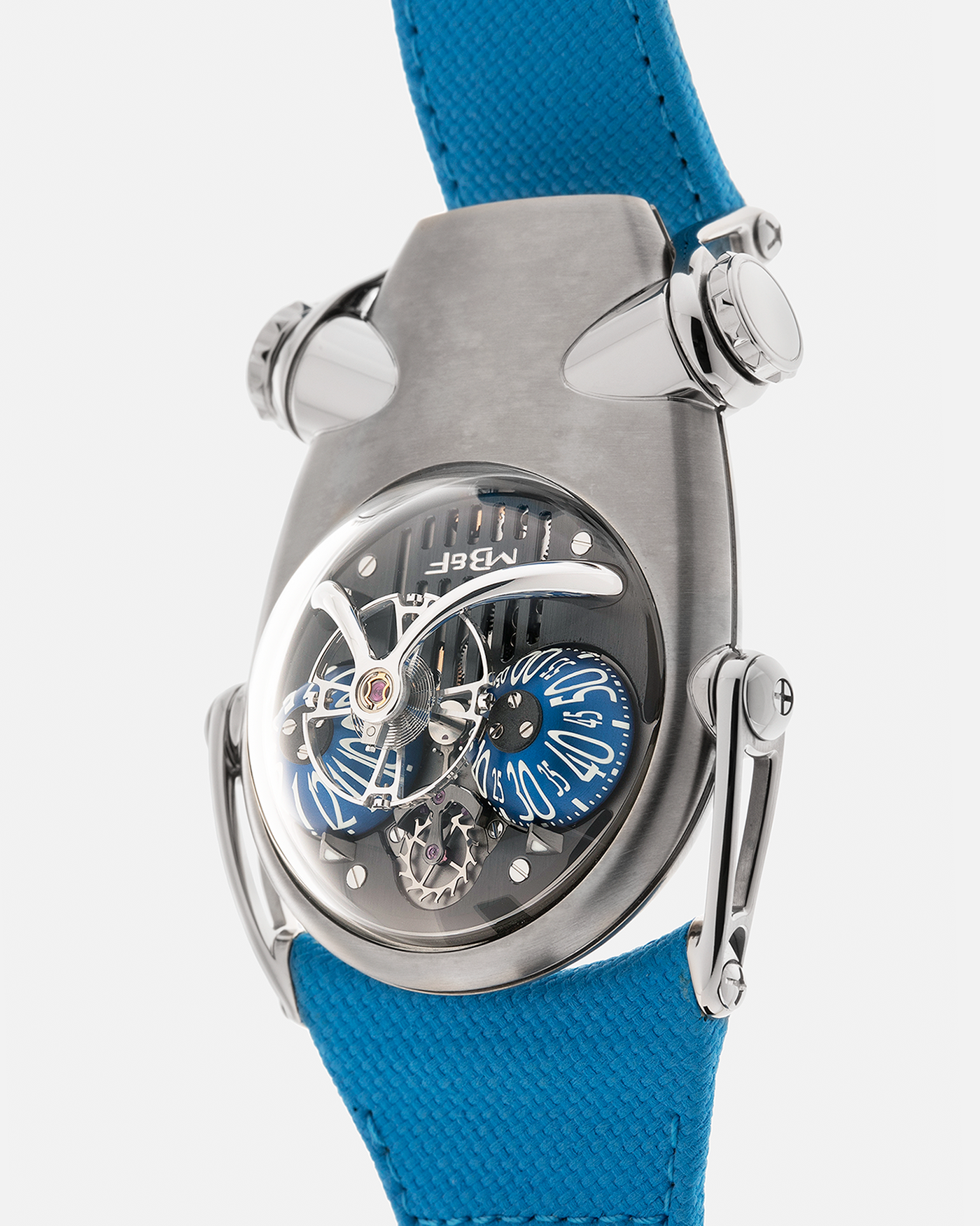 Brand: MB&F
Year: 2022
Model: HM10 ‘Bulldog’
Reference: 100.TL.BL
Material: Grade 5 Titanium
Movement: In-House Flying 14mm Balance Wheel with Four Floating Traditional Regulating Screws, Manual-Winding
Case Dimensions: 54mm (Including Lugs) x 45mm (Width) x 24mm (Height)
Strap: MB&F Proprietary Blue Calf Leather Velcro Strap with Signed Titanium Buckle