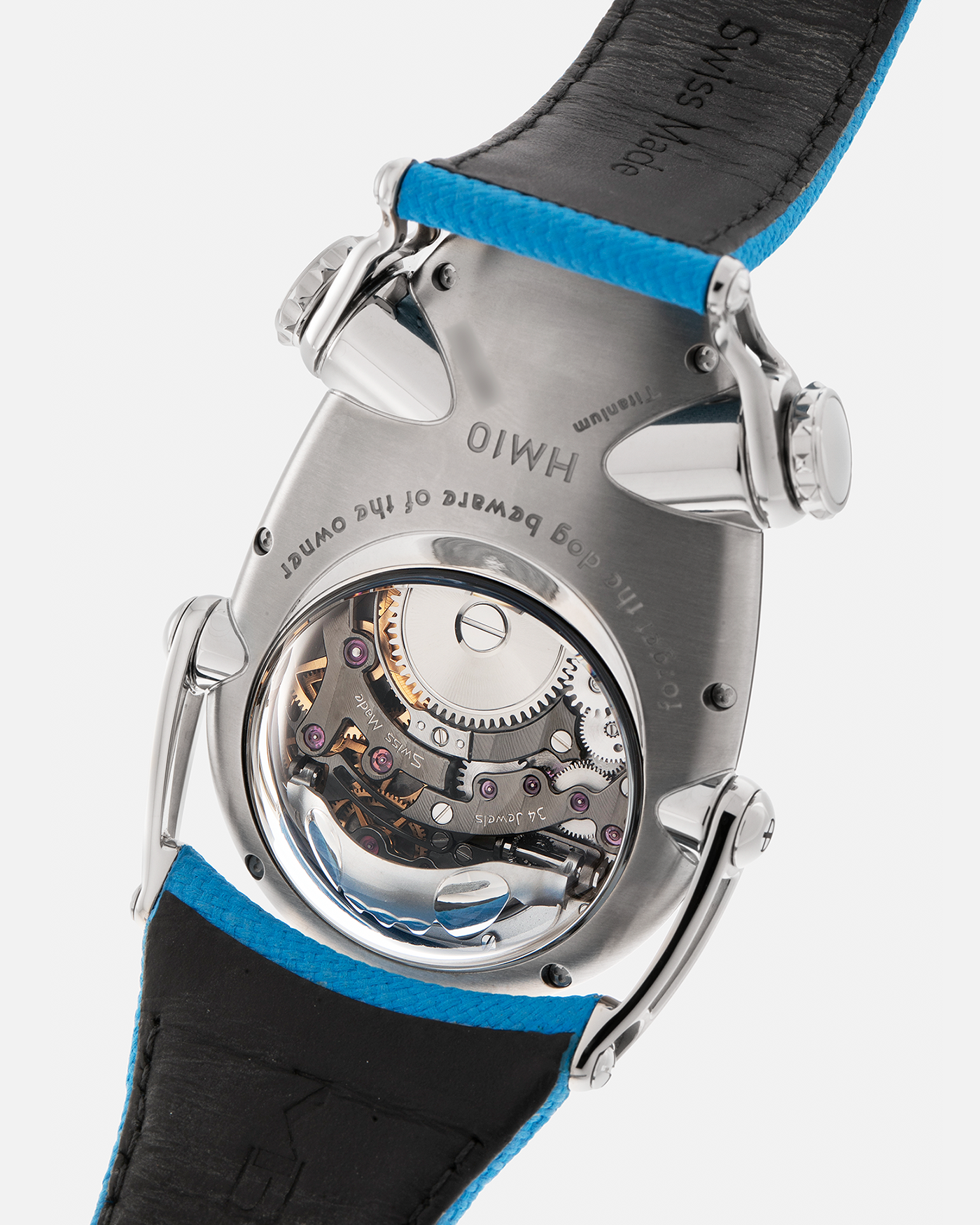 Brand: MB&F
Year: 2022
Model: HM10 ‘Bulldog’
Reference: 100.TL.BL
Material: Grade 5 Titanium
Movement: In-House Flying 14mm Balance Wheel with Four Floating Traditional Regulating Screws, Manual-Winding
Case Dimensions: 54mm (Including Lugs) x 45mm (Width) x 24mm (Height)
Strap: MB&F Proprietary Blue Calf Leather Velcro Strap with Signed Titanium Buckle