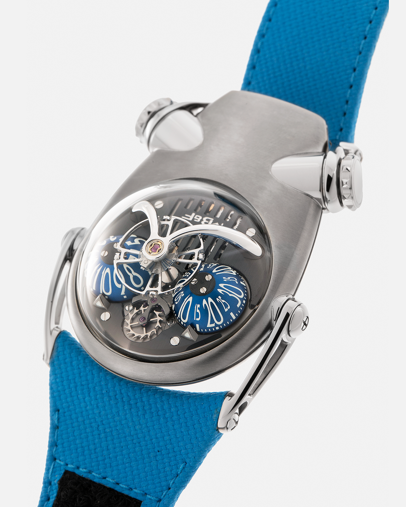 Brand: MB&F
Year: 2022
Model: HM10 ‘Bulldog’
Reference: 100.TL.BL
Material: Grade 5 Titanium
Movement: In-House Flying 14mm Balance Wheel with Four Floating Traditional Regulating Screws, Manual-Winding
Case Dimensions: 54mm (Including Lugs) x 45mm (Width) x 24mm (Height)
Strap: MB&F Proprietary Blue Calf Leather Velcro Strap with Signed Titanium Buckle