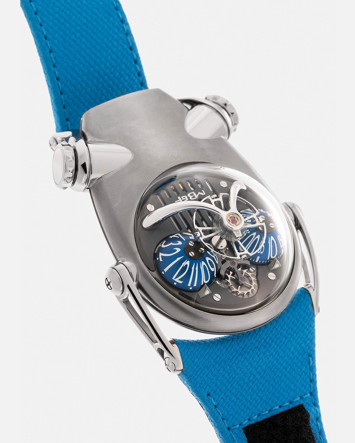 Brand: MB&F
Year: 2022
Model: HM10 ‘Bulldog’
Reference: 100.TL.BL
Material: Grade 5 Titanium
Movement: In-House Flying 14mm Balance Wheel with Four Floating Traditional Regulating Screws, Manual-Winding
Case Dimensions: 54mm (Including Lugs) x 45mm (Width) x 24mm (Height)
Strap: MB&F Proprietary Blue Calf Leather Velcro Strap with Signed Titanium Buckle