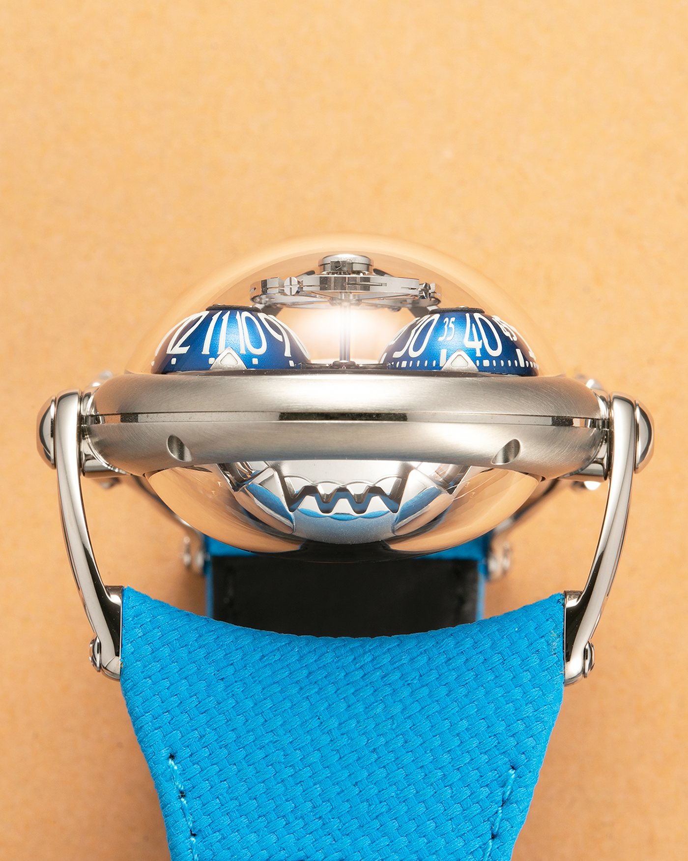 Brand: MB&F
Year: 2022
Model: HM10 ‘Bulldog’
Reference: 100.TL.BL
Material: Grade 5 Titanium
Movement: In-House Flying 14mm Balance Wheel with Four Floating Traditional Regulating Screws, Manual-Winding
Case Dimensions: 54mm (Including Lugs) x 45mm (Width) x 24mm (Height)
Strap: MB&F Proprietary Blue Calf Leather Velcro Strap with Signed Titanium Buckle