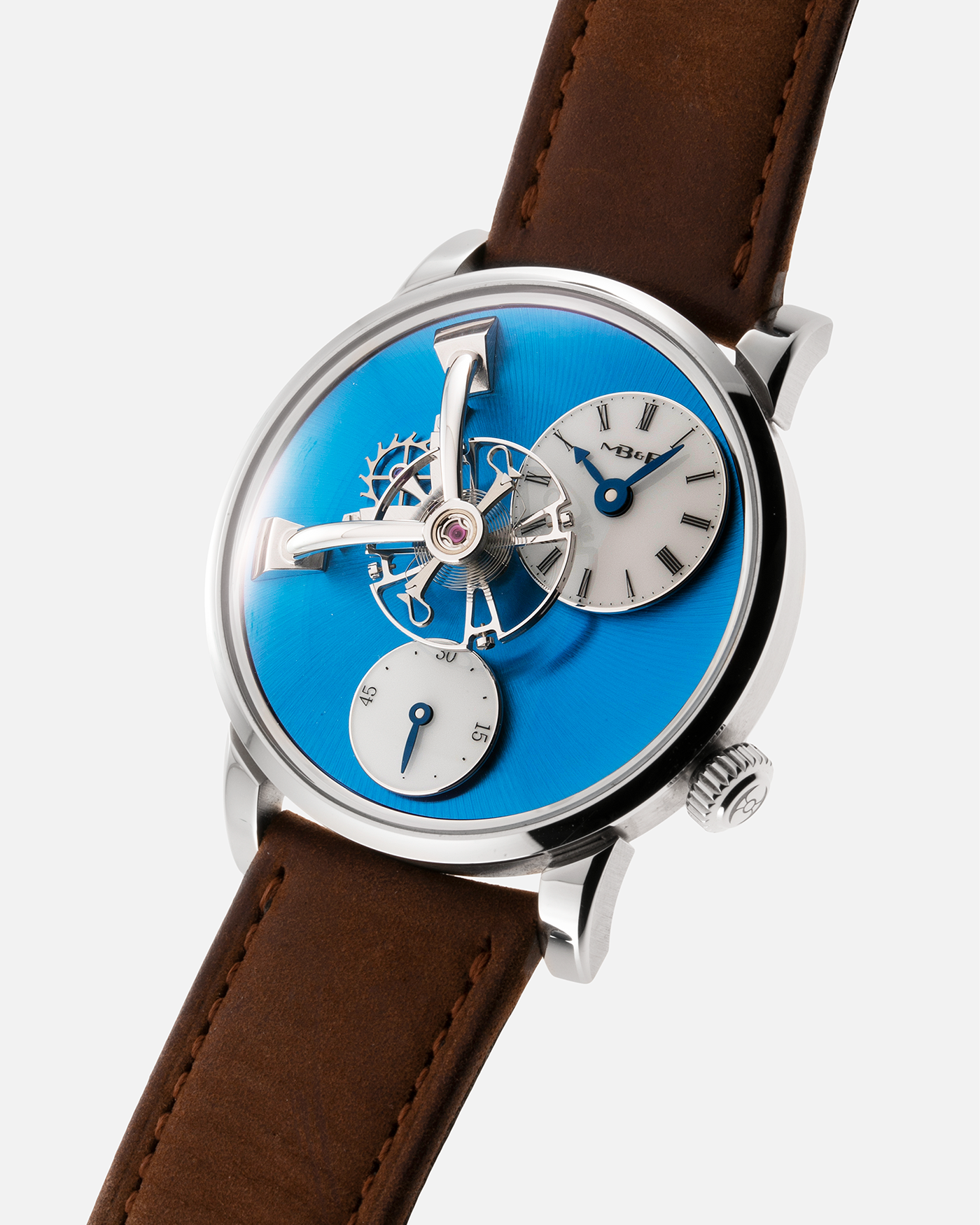 Brand: MB&F Year: 2022 Model: LM101 Steel Blue Material: Stainless Steel with Blue Baseplate Movement: In-House 3-Dimensional MB&F Caliber in Collaboration with Kari Voutilainen, Manual-Winding Case Diameter: 40mm Bracelet/Strap: MB&F Brown Suede Strap and Signed Palladium Deployant Clasp