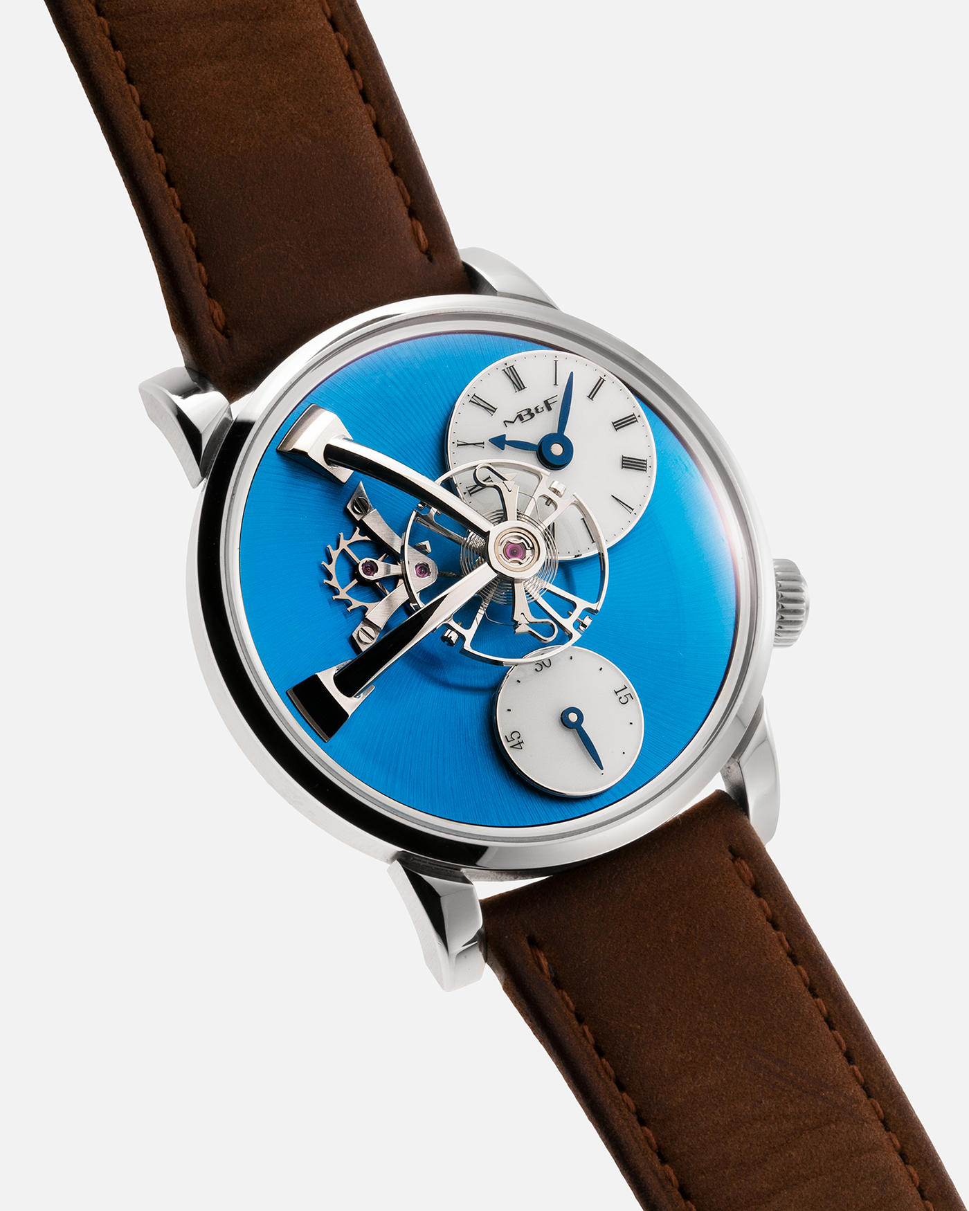 Brand: MB&F Year: 2022 Model: LM101 Steel Blue Material: Stainless Steel with Blue Baseplate Movement: In-House 3-Dimensional MB&F Caliber in Collaboration with Kari Voutilainen, Manual-Winding Case Diameter: 40mm Bracelet/Strap: MB&F Brown Suede Strap and Signed Palladium Deployant Clasp