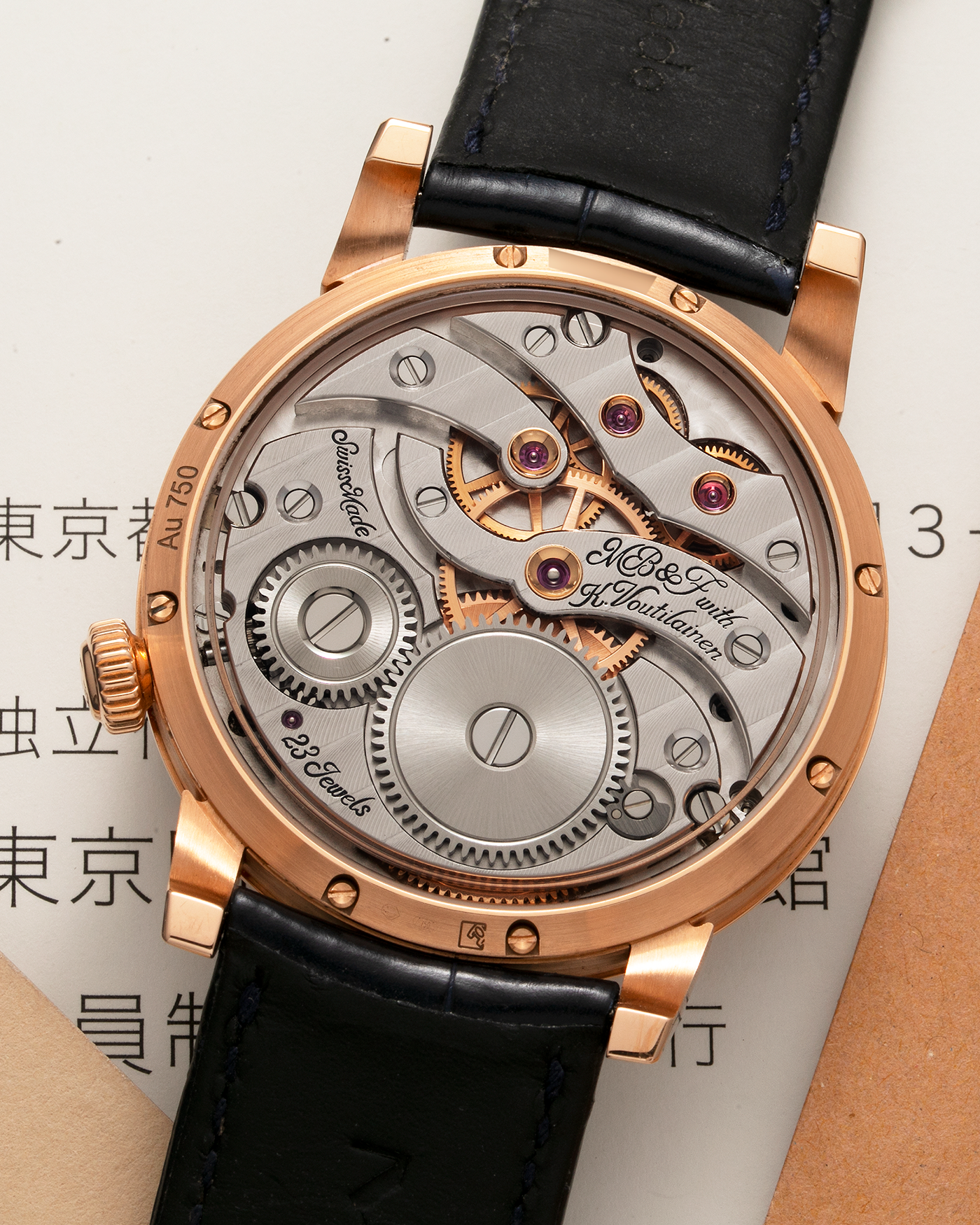 Brand: MB&F Year: 2022 Model: Legacy Machine 101 ‘Red Gold’ Reference: 51.RL.W Material: 18-carat Red Gold Movement: In-House 3-Dimensional MB&F Caliber in Collaboration with Kari Voutilainen, Manual-Winding Case Dimensions: 40mm x 16mm Lug Width: 21mm Strap: MB&F Dark Navy Alligator Strap and Signed Palladium Deployant Clasp
