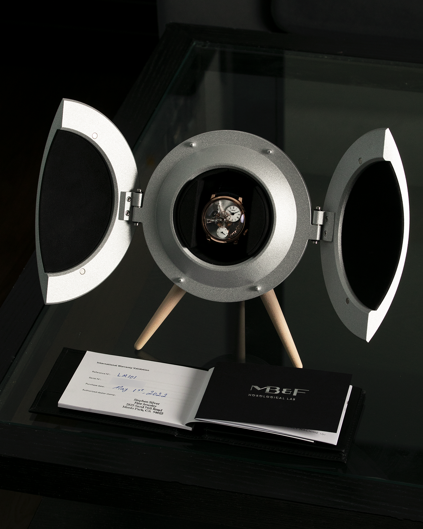 Brand: MB&F Year: 2022 Model: Legacy Machine 101 ‘Red Gold’ Reference: 51.RL.W Material: 18-carat Red Gold Movement: In-House 3-Dimensional MB&F Caliber in Collaboration with Kari Voutilainen, Manual-Winding Case Dimensions: 40mm x 16mm Lug Width: 21mm Strap: MB&F Dark Navy Alligator Strap and Signed Palladium Deployant Clasp