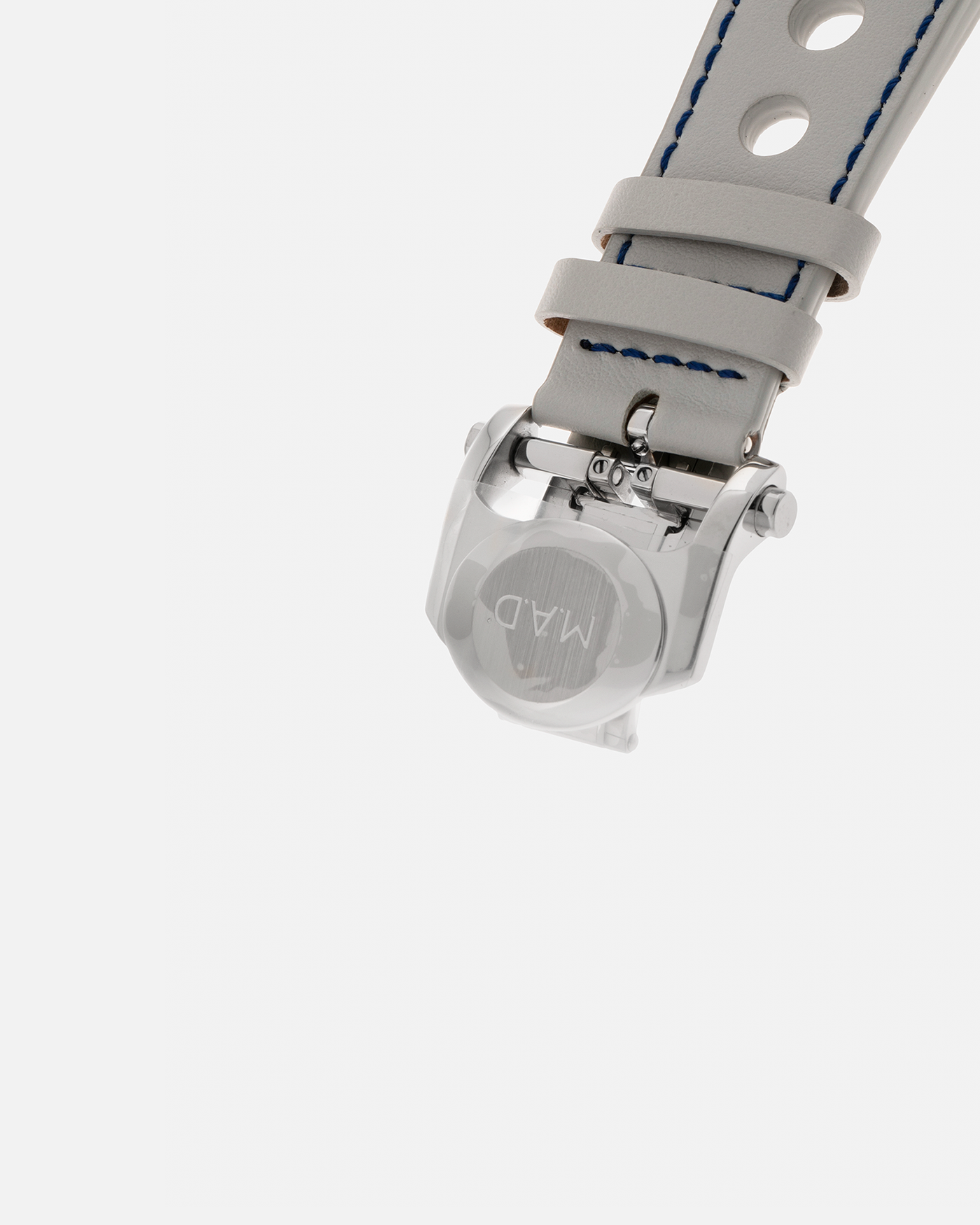 Brand: MB&F
Year: 2021
Model: MAD 1 Blue
Material: Stainless Steel and Titanium
Movement: Miyota Cal. 821A, Self-Winding
Case Dimensions: 42mm x 18.8mm (Lug-to-Lug 50.5mm)
Strap: MB&F White Grey Leather Rally Strap with Signed Stainless Steel Deployant 