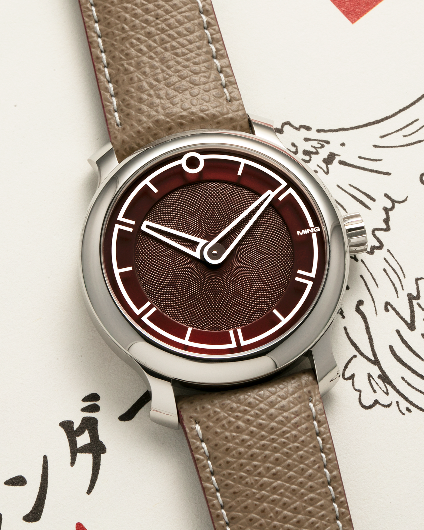 Brand: MING
Year: 2022
Model: 17.09
Material: Stainless Steel 316L
Movement: MING Cal. 330.M1 (Heavily Modified Sellita Cal. SW330-2), Manual-Winding
Case Dimensions: 38mm x 10mm
Lug Width: 20mm
Strap: Jean Rousseau Taupe Leather for MING with Signed Stainless Steel Tang Buckle