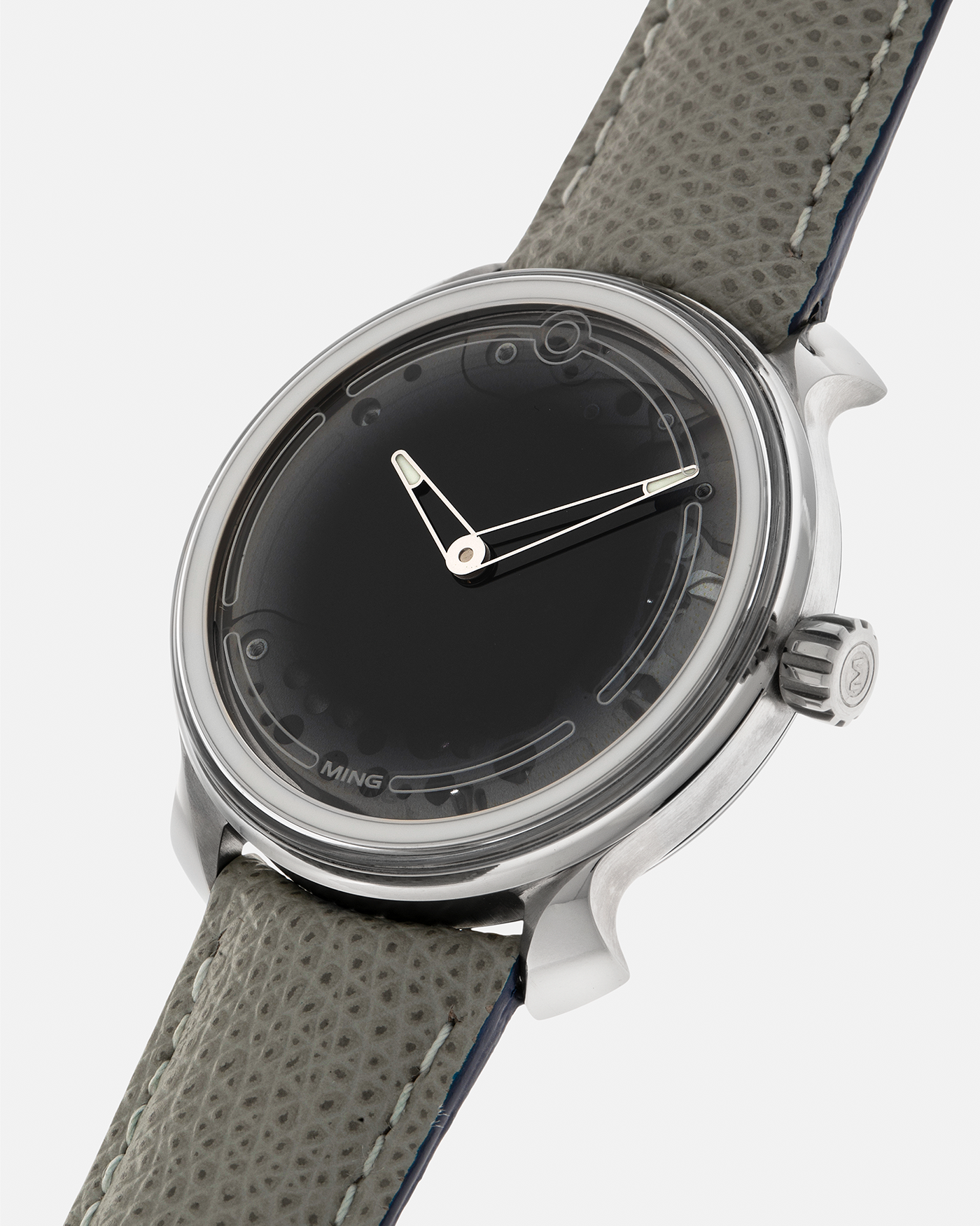 Brand: MING
Year: 2019
Model: 19.01
Material: Grade 5 Titanium
Movement: Schwarz-Etienne for MING Cal. MSE100.1, Manual-Winding
Case Dimensions: 39mm x 10.9mm (Lug-to-Lug 43mm)
Lug Width: 20mm
Strap: Jean Rousseau for MING Taupe Calf Leather Strap with Signed Grade 5 Titanium Tang Buckle