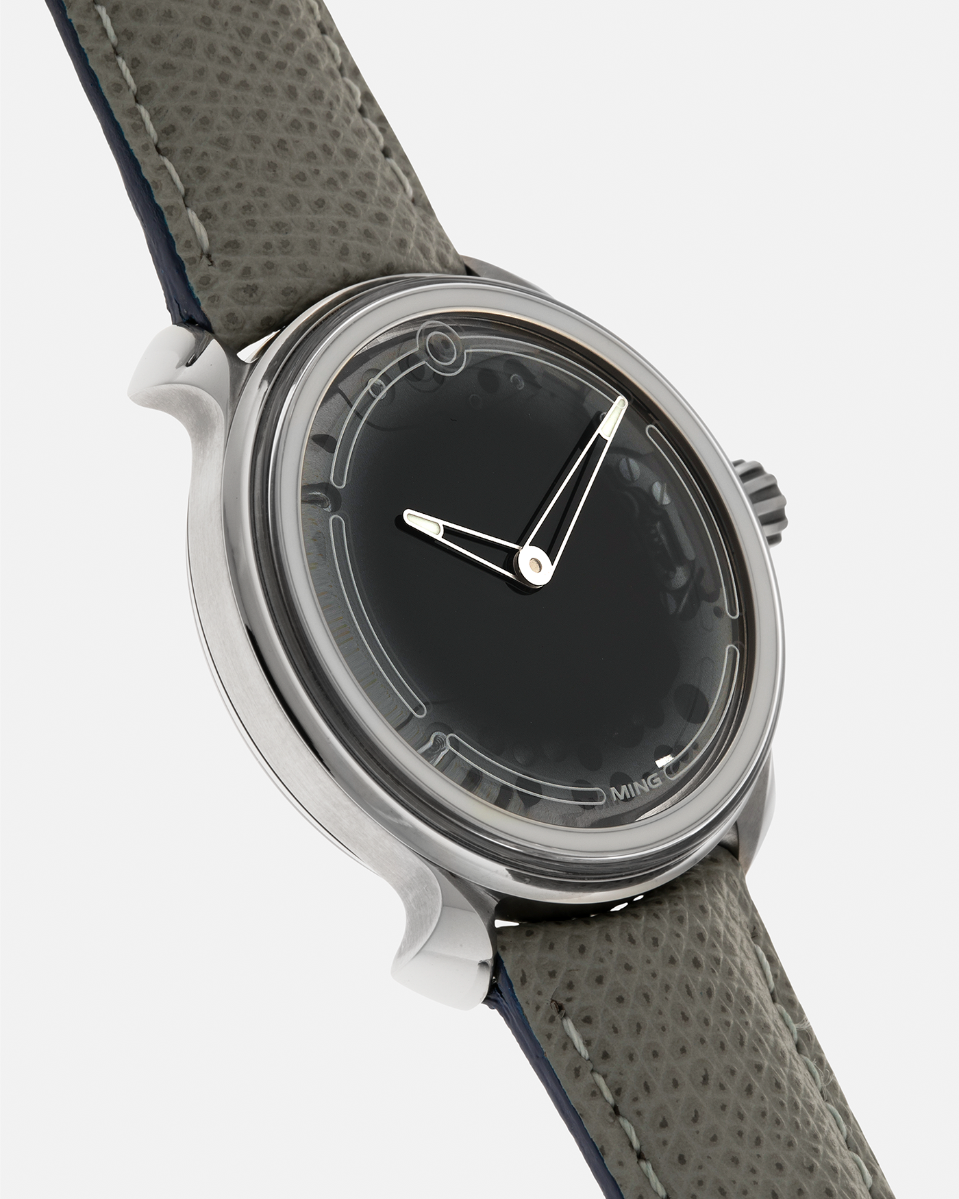 Brand: MING
Year: 2019
Model: 19.01
Material: Grade 5 Titanium
Movement: Schwarz-Etienne for MING Cal. MSE100.1, Manual-Winding
Case Dimensions: 39mm x 10.9mm (Lug-to-Lug 43mm)
Lug Width: 20mm
Strap: Jean Rousseau for MING Taupe Calf Leather Strap with Signed Grade 5 Titanium Tang Buckle