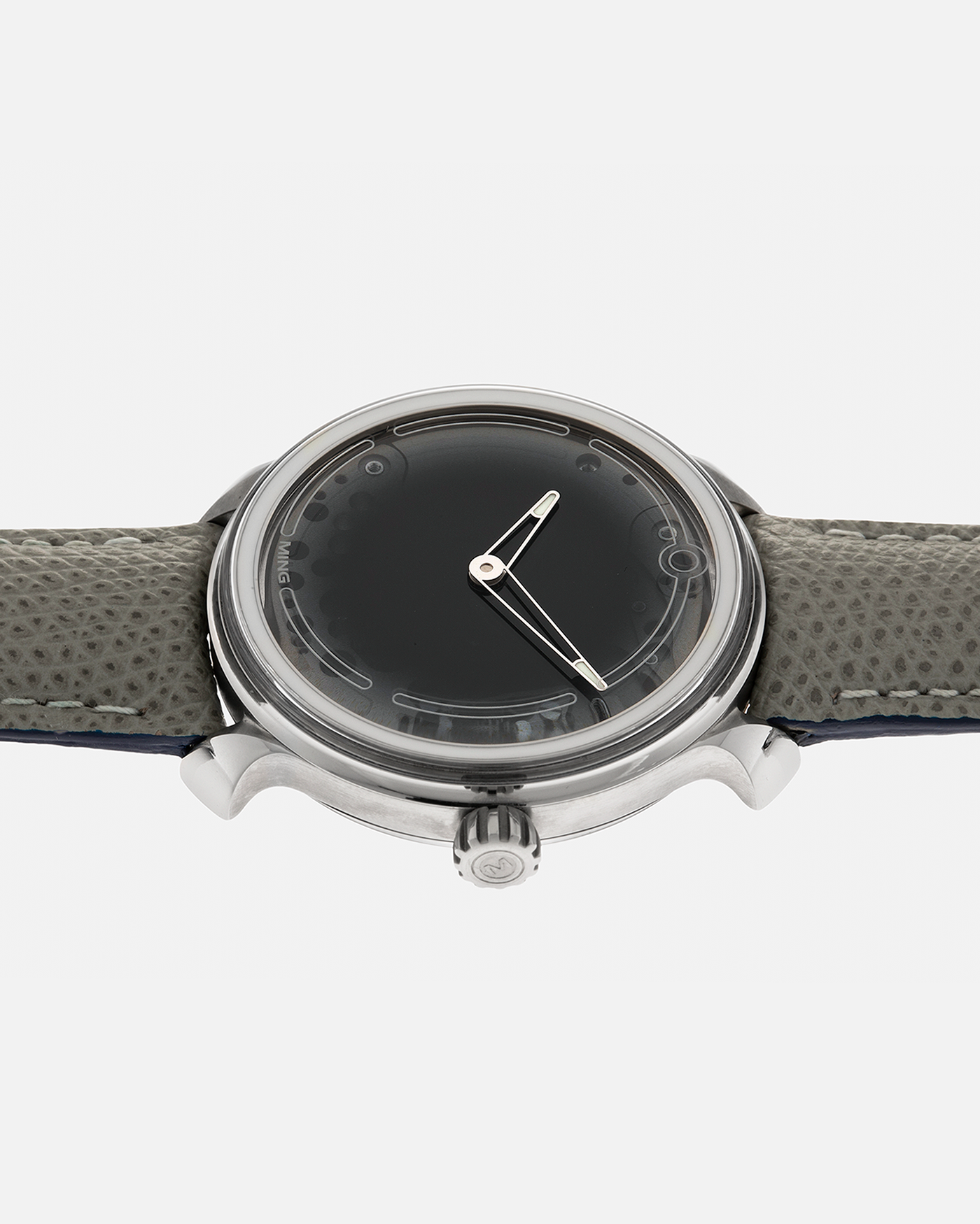 Brand: MING
Year: 2019
Model: 19.01
Material: Grade 5 Titanium
Movement: Schwarz-Etienne for MING Cal. MSE100.1, Manual-Winding
Case Dimensions: 39mm x 10.9mm (Lug-to-Lug 43mm)
Lug Width: 20mm
Strap: Jean Rousseau for MING Taupe Calf Leather Strap with Signed Grade 5 Titanium Tang Buckle