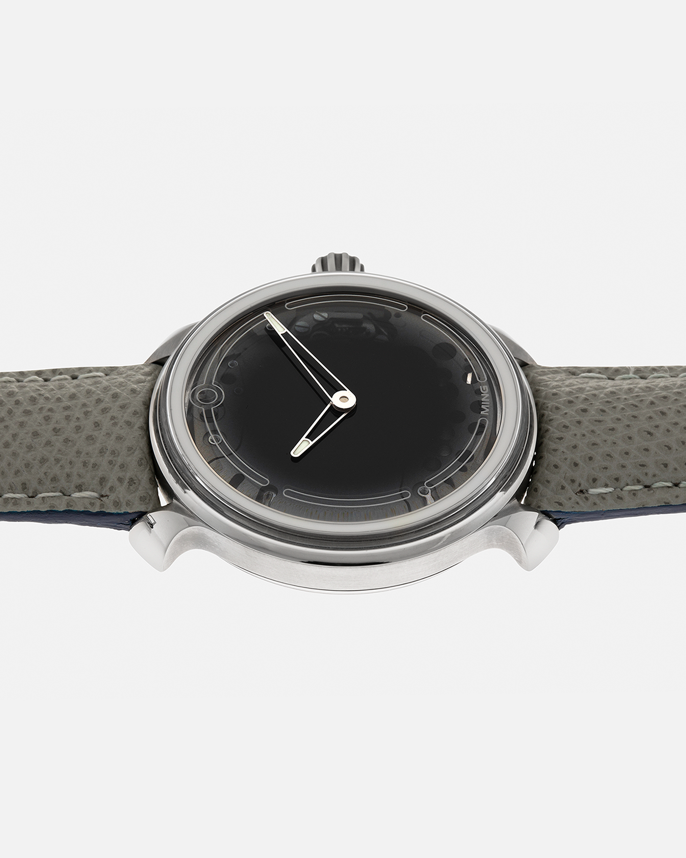 Brand: MING
Year: 2019
Model: 19.01
Material: Grade 5 Titanium
Movement: Schwarz-Etienne for MING Cal. MSE100.1, Manual-Winding
Case Dimensions: 39mm x 10.9mm (Lug-to-Lug 43mm)
Lug Width: 20mm
Strap: Jean Rousseau for MING Taupe Calf Leather Strap with Signed Grade 5 Titanium Tang Buckle