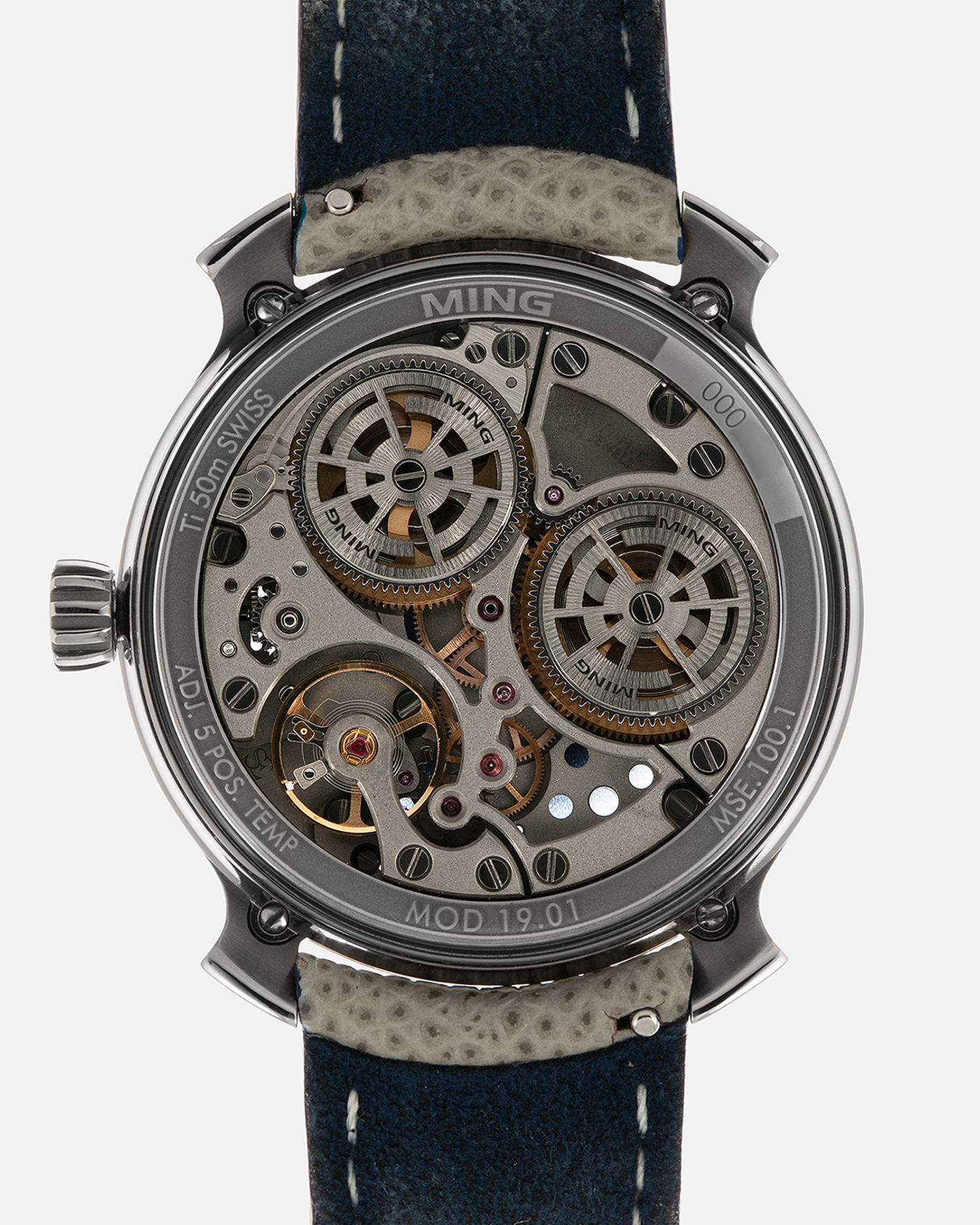 Brand: MING
Year: 2019
Model: 19.01
Material: Grade 5 Titanium
Movement: Schwarz-Etienne for MING Cal. MSE100.1, Manual-Winding
Case Dimensions: 39mm x 10.9mm (Lug-to-Lug 43mm)
Lug Width: 20mm
Strap: Jean Rousseau for MING Taupe Calf Leather Strap with Signed Grade 5 Titanium Tang Buckle