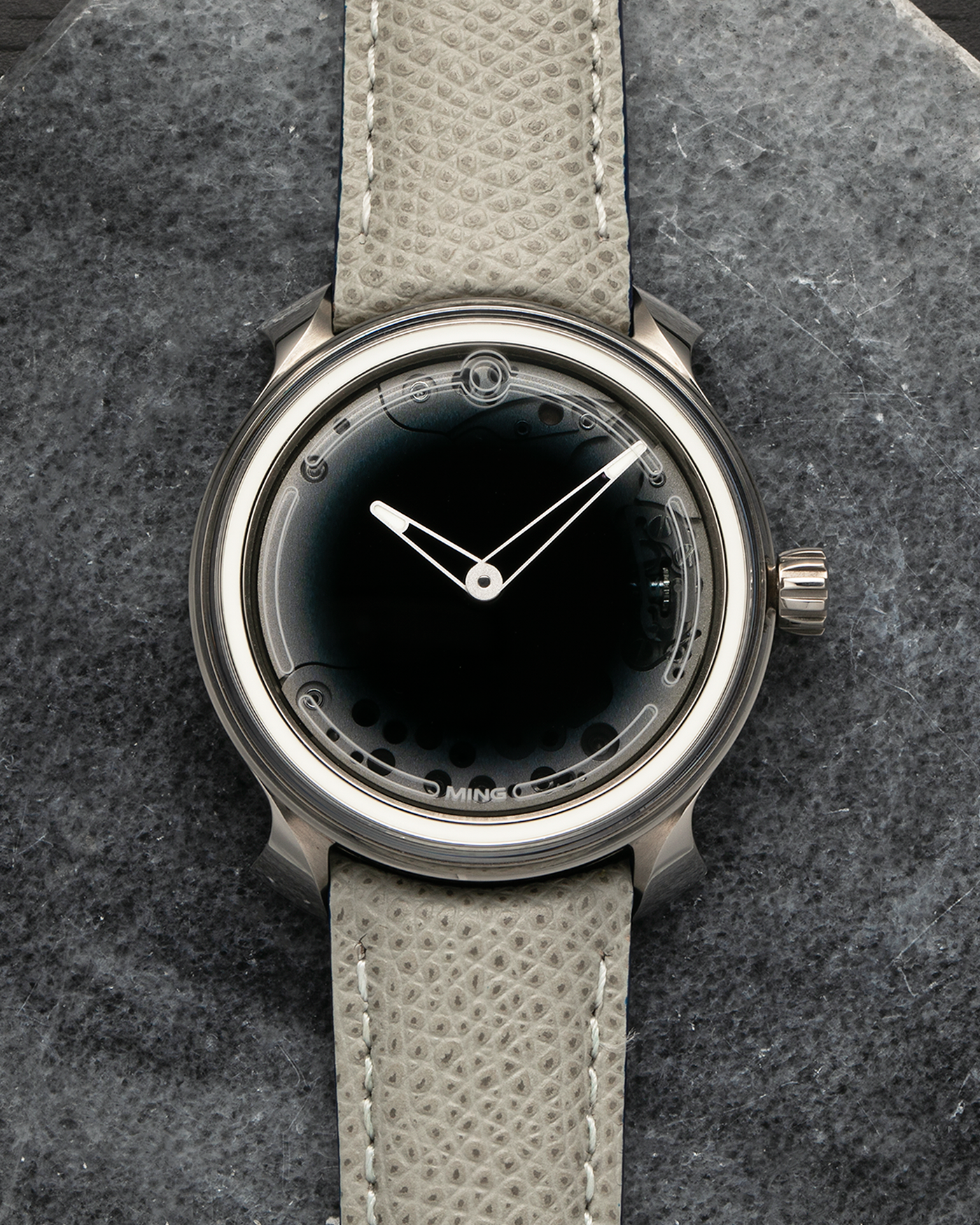 Brand: MING
Year: 2019
Model: 19.01
Material: Grade 5 Titanium
Movement: Schwarz-Etienne for MING Cal. MSE100.1, Manual-Winding
Case Dimensions: 39mm x 10.9mm (Lug-to-Lug 43mm)
Lug Width: 20mm
Strap: Jean Rousseau for MING Taupe Calf Leather Strap with Signed Grade 5 Titanium Tang Buckle