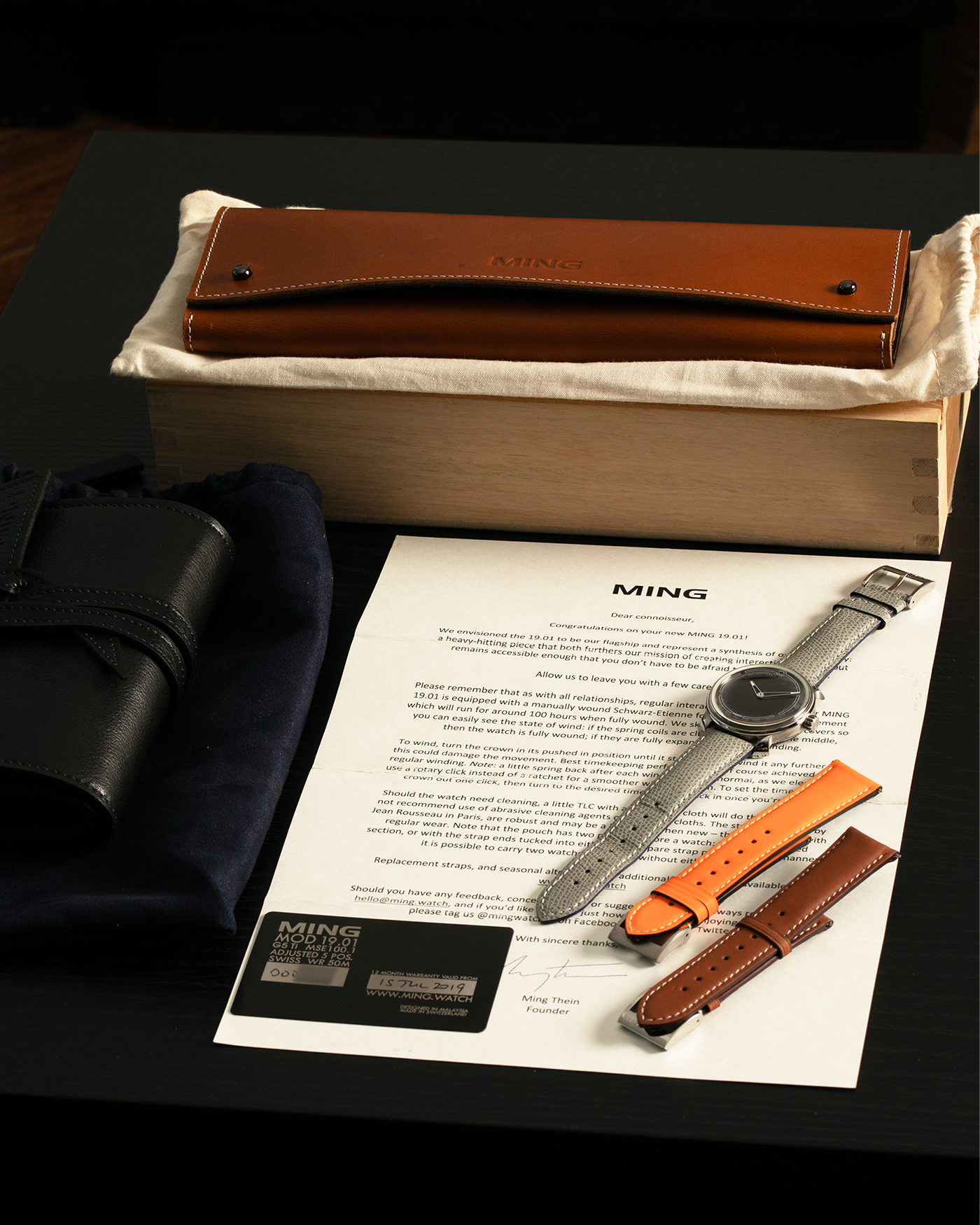 Brand: MING
Year: 2019
Model: 19.01
Material: Grade 5 Titanium
Movement: Schwarz-Etienne for MING Cal. MSE100.1, Manual-Winding
Case Dimensions: 39mm x 10.9mm (Lug-to-Lug 43mm)
Lug Width: 20mm
Strap: Jean Rousseau for MING Taupe Calf Leather Strap with Signed Grade 5 Titanium Tang Buckle