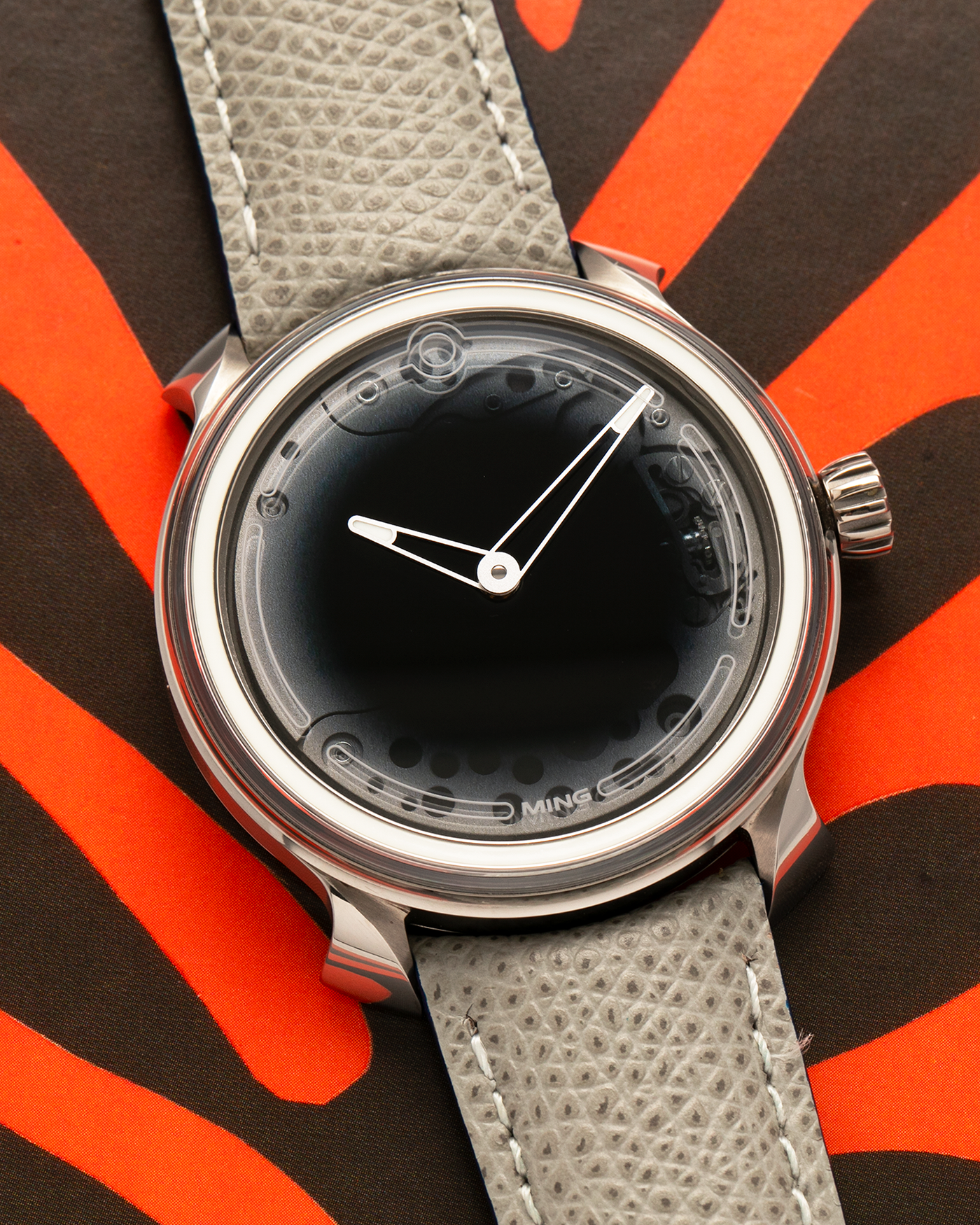 Brand: MING
Year: 2019
Model: 19.01
Material: Grade 5 Titanium
Movement: Schwarz-Etienne for MING Cal. MSE100.1, Manual-Winding
Case Dimensions: 39mm x 10.9mm (Lug-to-Lug 43mm)
Lug Width: 20mm
Strap: Jean Rousseau for MING Taupe Calf Leather Strap with Signed Grade 5 Titanium Tang Buckle