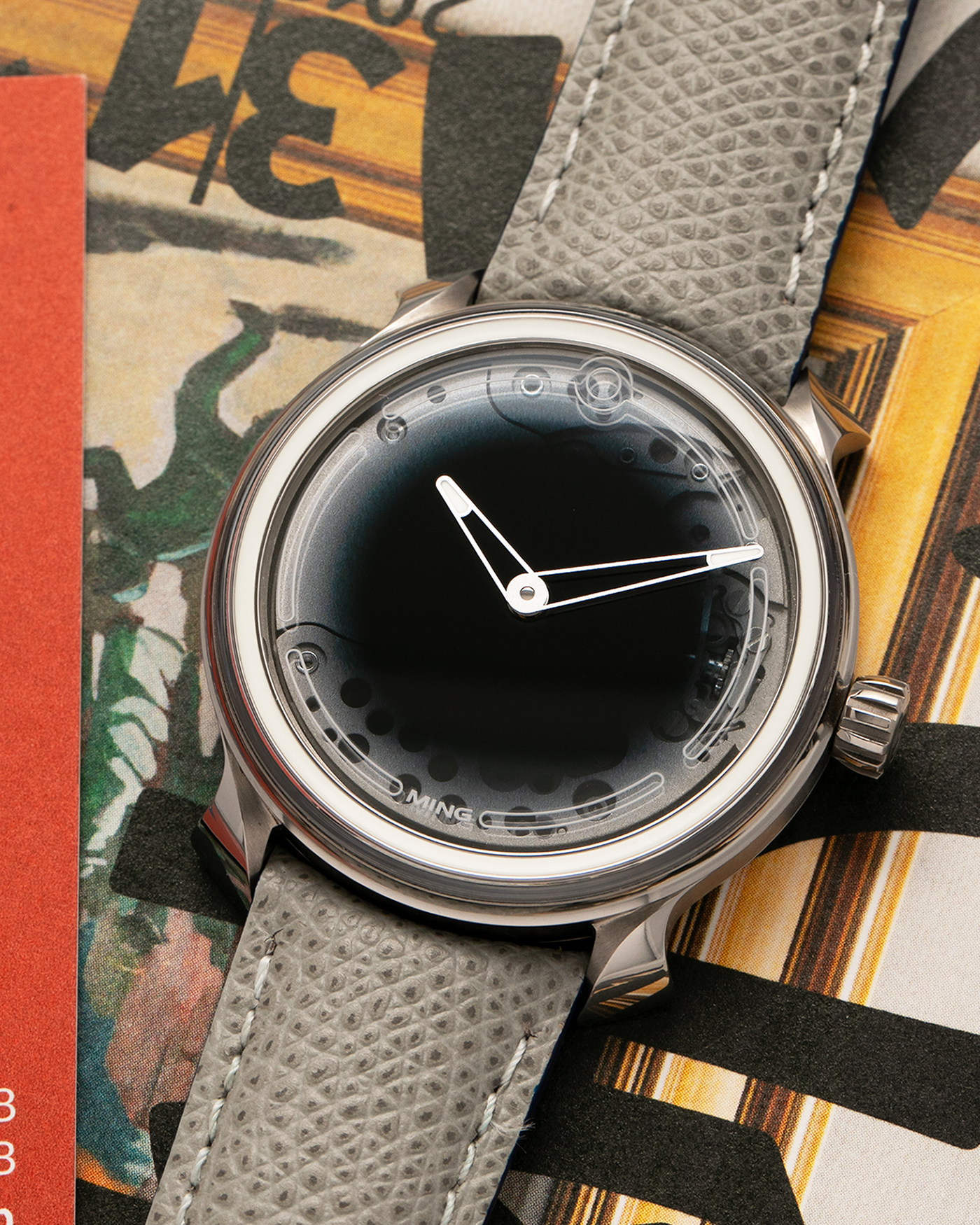 Brand: MING
Year: 2019
Model: 19.01
Material: Grade 5 Titanium
Movement: Schwarz-Etienne for MING Cal. MSE100.1, Manual-Winding
Case Dimensions: 39mm x 10.9mm (Lug-to-Lug 43mm)
Lug Width: 20mm
Strap: Jean Rousseau for MING Taupe Calf Leather Strap with Signed Grade 5 Titanium Tang Buckle