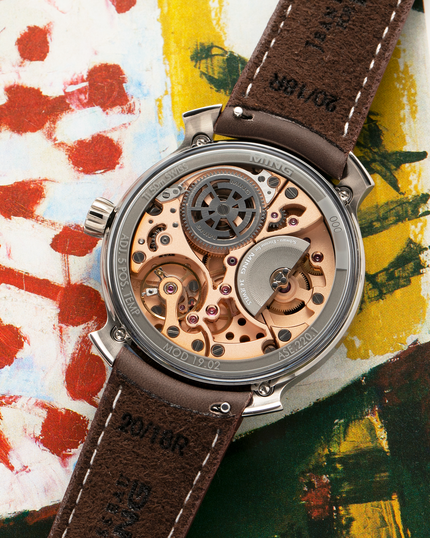 Brand: MING
Year: 2020
Model: 19.02 World Timer
Material: Grade 5 Titanium
Movement: Schwarz-Etienne for MING Cal. ASE 220.1, Manual-Winding
Case Dimensions: 39mm x 10.9mm (Lug-to-Lug 43.9mm)
Lug Width: 20mm
Straps: Jean Rousseau Brown Calf Leather Strap for MING with Signed Grade 5 Titanium Tang Buckle, additional Jean Rousseau Suede Black Leather Strap with Contrasting Orange Stitching for MING with Signed Grade 5 Titanium Tang Buckle