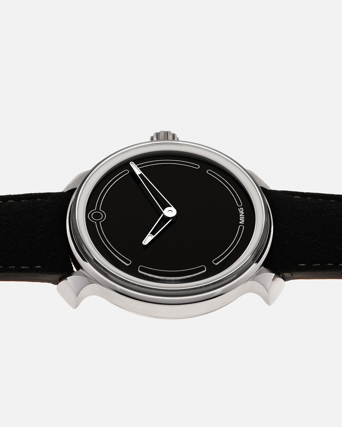 Brand: MING
Year: 2021
Model: 19.05
Material: Grade 5 Titanium
Movement: Schwarz-Etienne for MING Cal. ASE 200.1 Micro Rotor, Self-Winding
Case Diameter: 39mm x 10.9mm (Lug-to-Lug 43.9mm)
Lug Width: 20mm
Strap: Jean Rousseau Black Suede Leather Strap for MING with Signed Grade 5 Titanium Keeperless Flying Blade Buckle