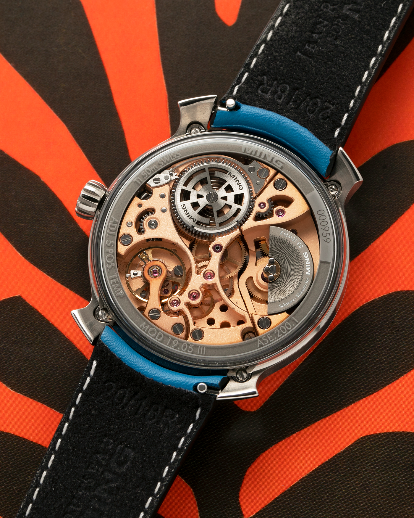 Brand: MING
Year: 2021
Model: 19.05, Limited to 15 Pieces
Material: Grade 5 Titanium
Movement: Schwarz-Etienne for MING Cal. ASE200.1, Manual-Winding
Case Dimensions: 39mm x 10.9mm (Lug-to-Lug 43mm)
Lug Width: 20mm
Strap/Bracelet: Jean Rousseau Sea Blue Calf Leather Strap for MING with Signed Grade 5 Titanium Tang Buckle, additional MING Universal Stainless Steel Bracelet