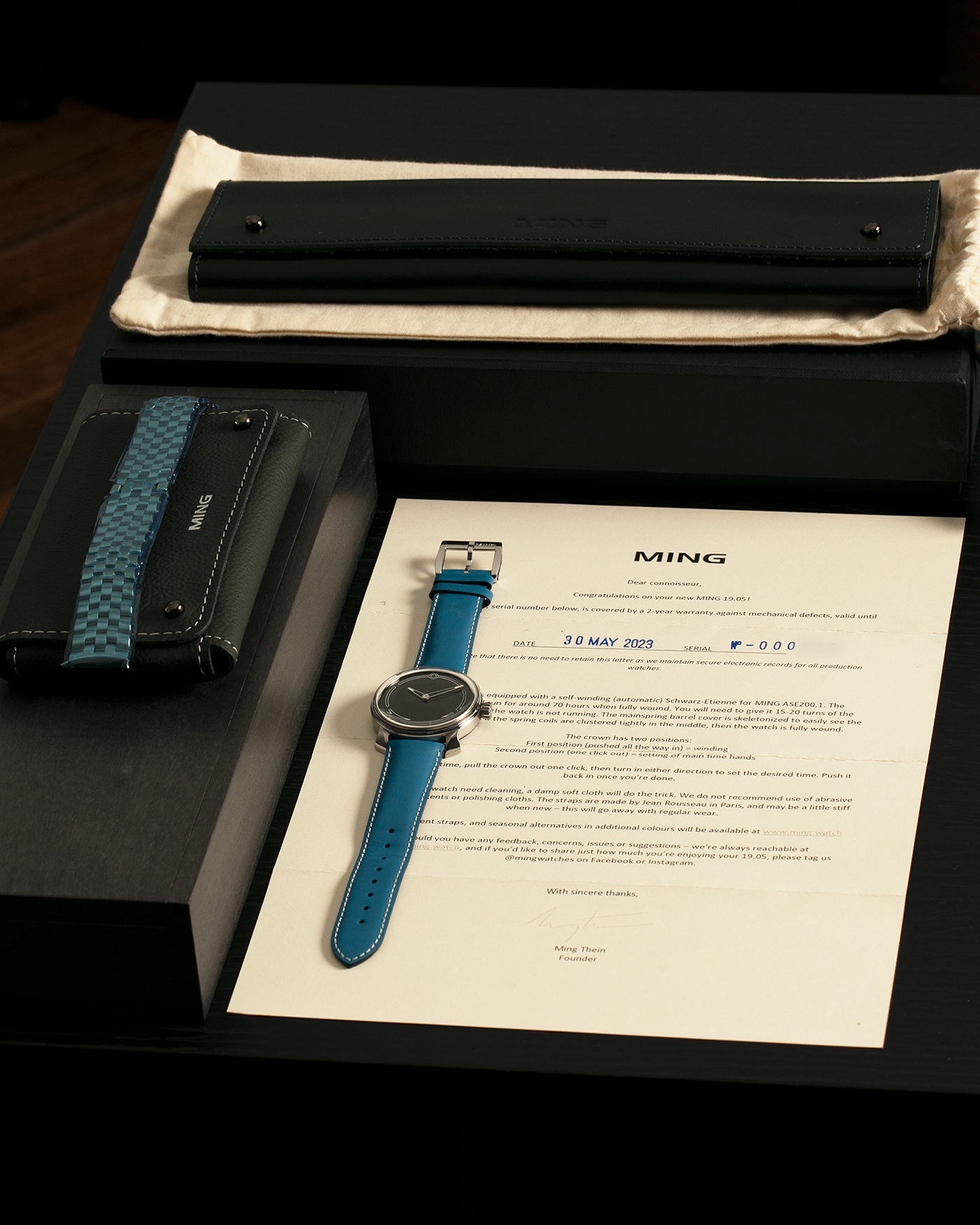 Brand: MING
Year: 2021
Model: 19.05, Limited to 15 Pieces
Material: Grade 5 Titanium
Movement: Schwarz-Etienne for MING Cal. ASE200.1, Manual-Winding
Case Dimensions: 39mm x 10.9mm (Lug-to-Lug 43mm)
Lug Width: 20mm
Strap/Bracelet: Jean Rousseau Sea Blue Calf Leather Strap for MING with Signed Grade 5 Titanium Tang Buckle, additional MING Universal Stainless Steel Bracelet