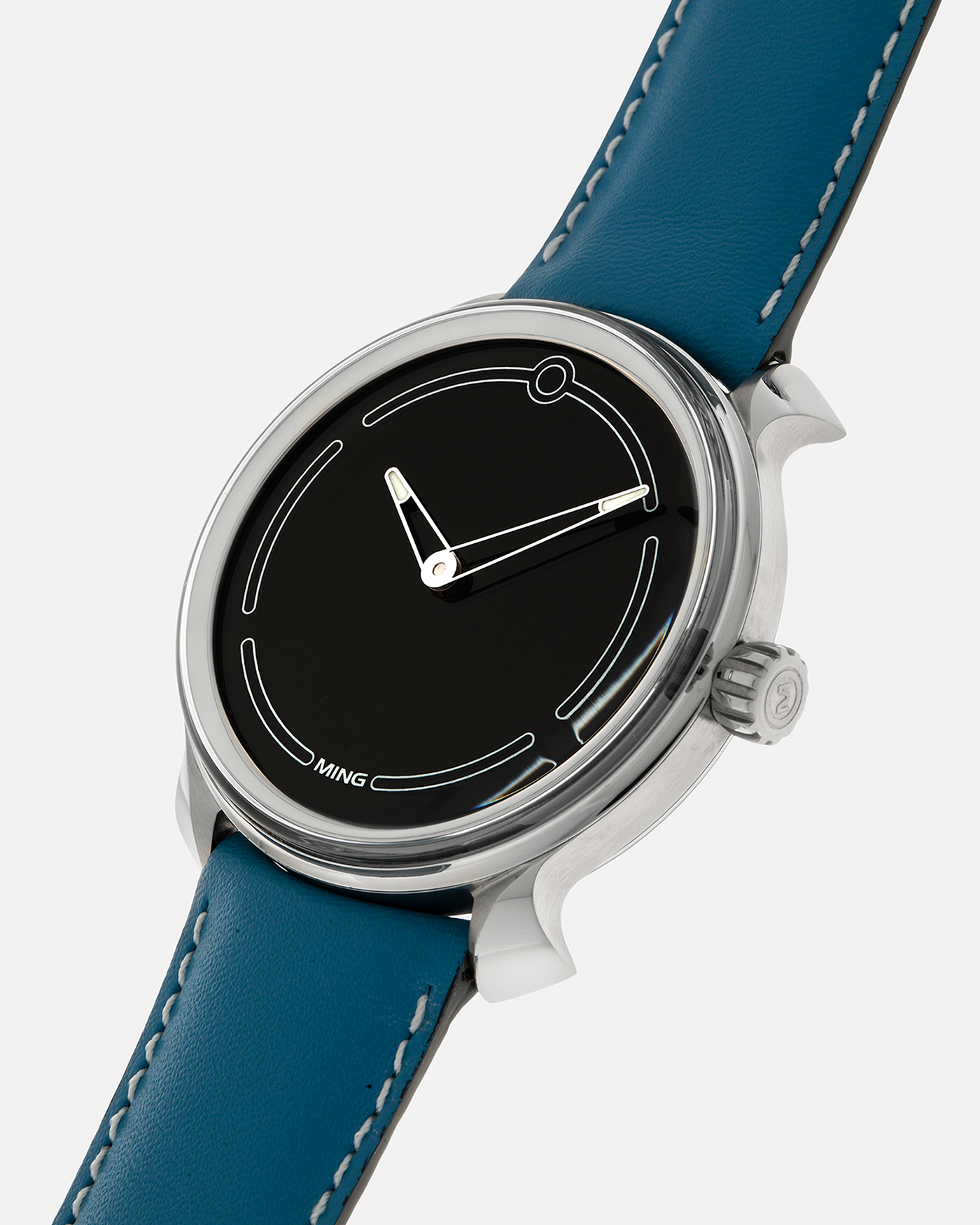 Brand: MING
Year: 2021
Model: 19.05, Limited to 15 Pieces
Material: Grade 5 Titanium
Movement: Schwarz-Etienne for MING Cal. ASE200.1, Manual-Winding
Case Dimensions: 39mm x 10.9mm (Lug-to-Lug 43mm)
Lug Width: 20mm
Strap/Bracelet: Jean Rousseau Sea Blue Calf Leather Strap for MING with Signed Grade 5 Titanium Tang Buckle, additional MING Universal Stainless Steel Bracelet