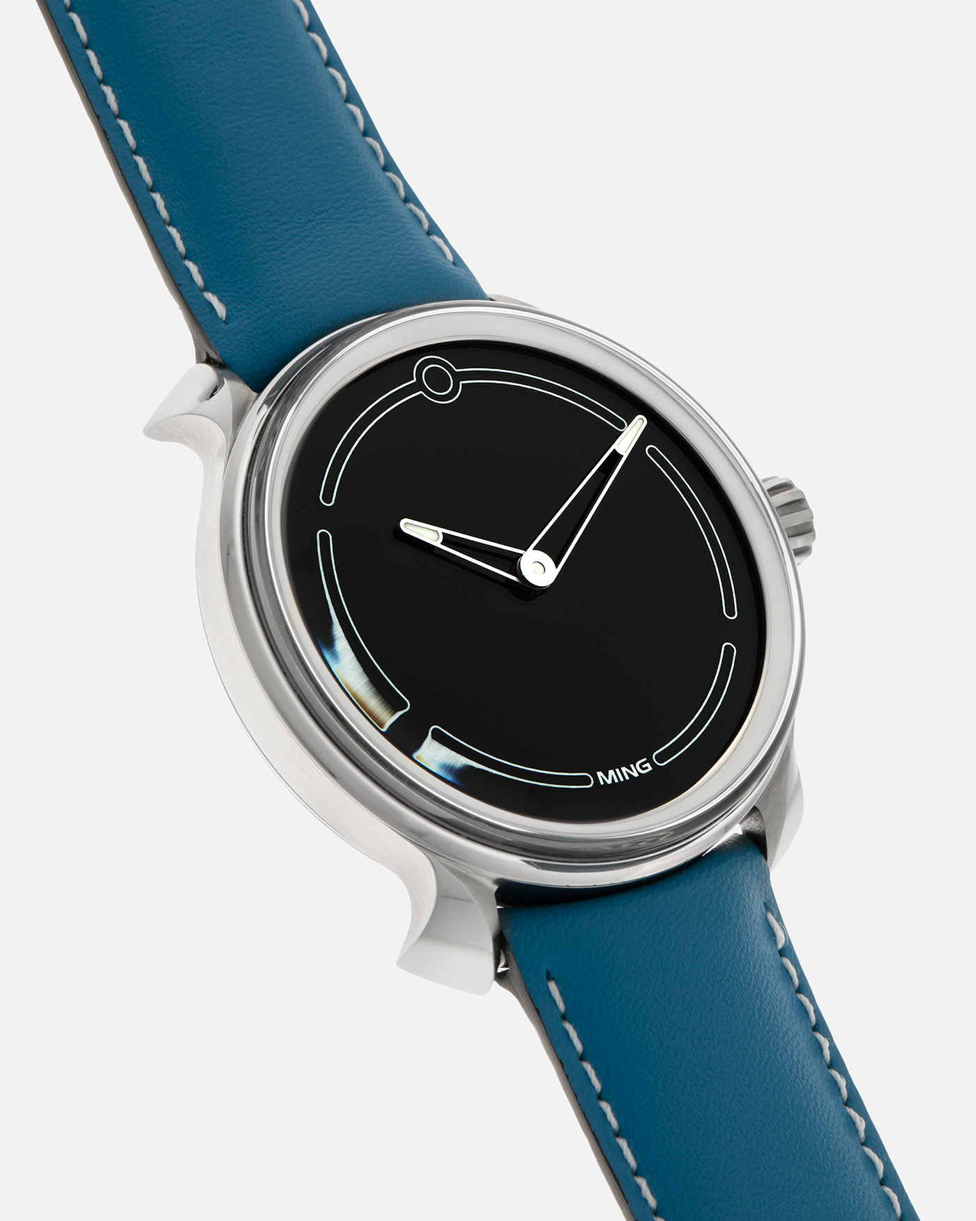 Brand: MING
Year: 2021
Model: 19.05, Limited to 15 Pieces
Material: Grade 5 Titanium
Movement: Schwarz-Etienne for MING Cal. ASE200.1, Manual-Winding
Case Dimensions: 39mm x 10.9mm (Lug-to-Lug 43mm)
Lug Width: 20mm
Strap/Bracelet: Jean Rousseau Sea Blue Calf Leather Strap for MING with Signed Grade 5 Titanium Tang Buckle, additional MING Universal Stainless Steel Bracelet