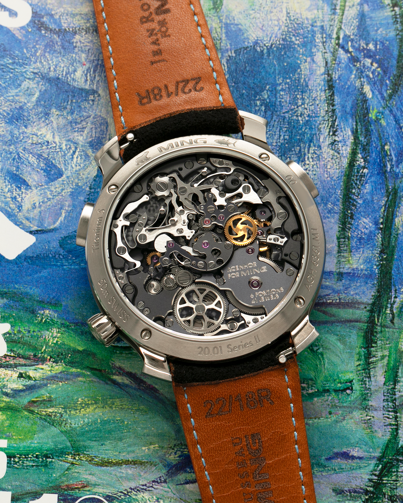 Brand: MING
Year: 2022
Model: 20.01 Series II ‘Special Projects Cave’, Limited to 50 pieces
Material: Grade 5 Titanium Case, DLC-Coated Case Band, Grade 2 Titanium Dial Base
Movement: Agenhor for MING Agengraphe Cal. 6361.M1, Manual-Winding
Case Dimensions: 41.5mm x 14.2mm (Lug-to-Lug 46mm)
Lug Width: 22mm
Strap: Jean Rousseau Black Alcantara for MING with Signed DLC-Coated Grade 5 Titanium Keeperless Flying Blade Buckle