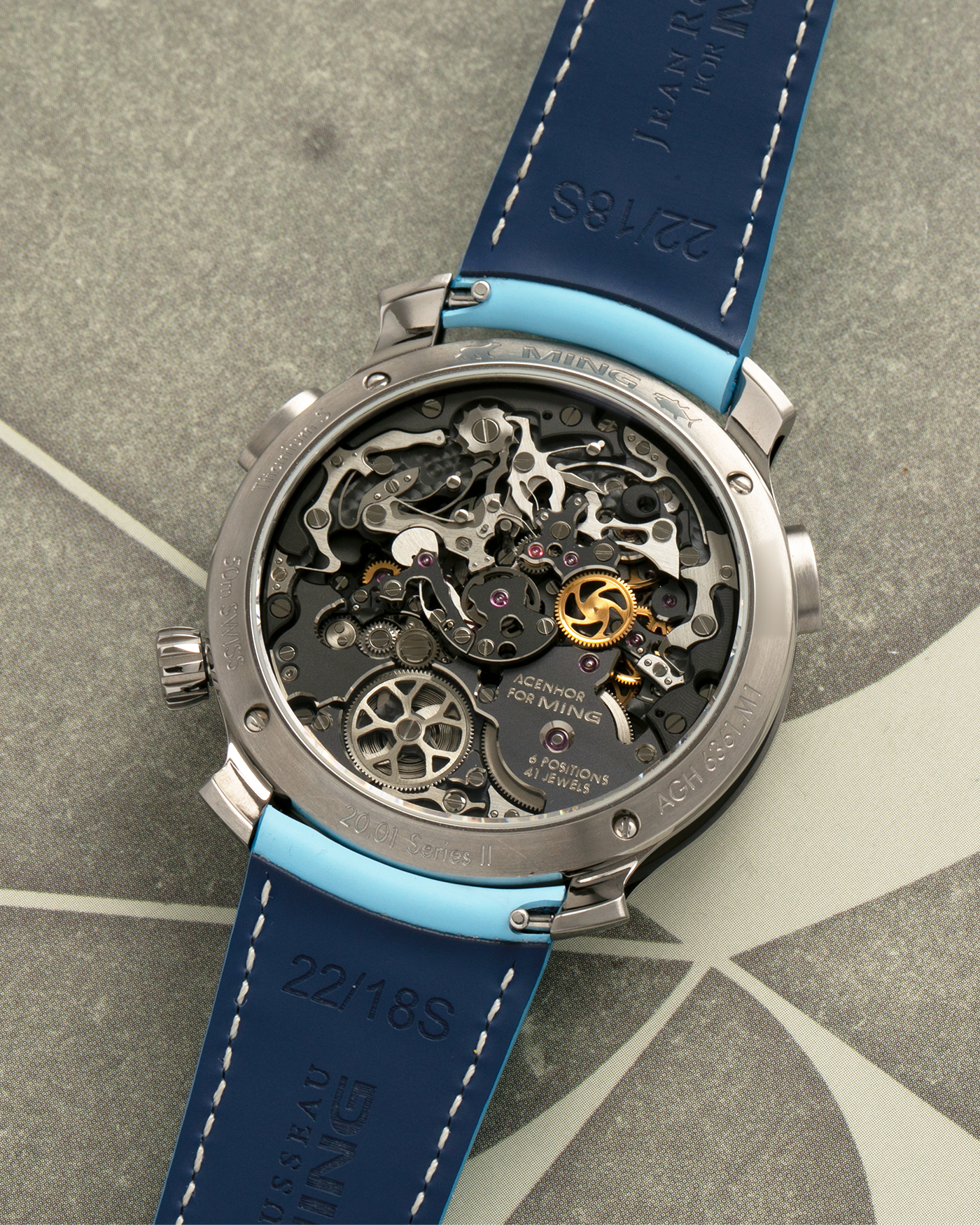 Brand: MING
Year: 2023
Model: 20.01 Series II ‘Special Projects Cave’, Limited to 50 pieces
Material: Grade 5 Titanium Case, DLC-Coated Case Band, Grade 2 Titanium Dial Base
Movement: Agenhor for MING Agengraphe Cal. 6361.M1, Manual-Winding
Case Dimensions: 41.5mm x 14.2mm (Lug-to-Lug 46mm)
Lug Width: 22mm
Strap: Jean Rousseau Sky Blue Calf Leather Strap for MING with Signed Grade 5 Titanium Keeperless Flying Blade Buckle
