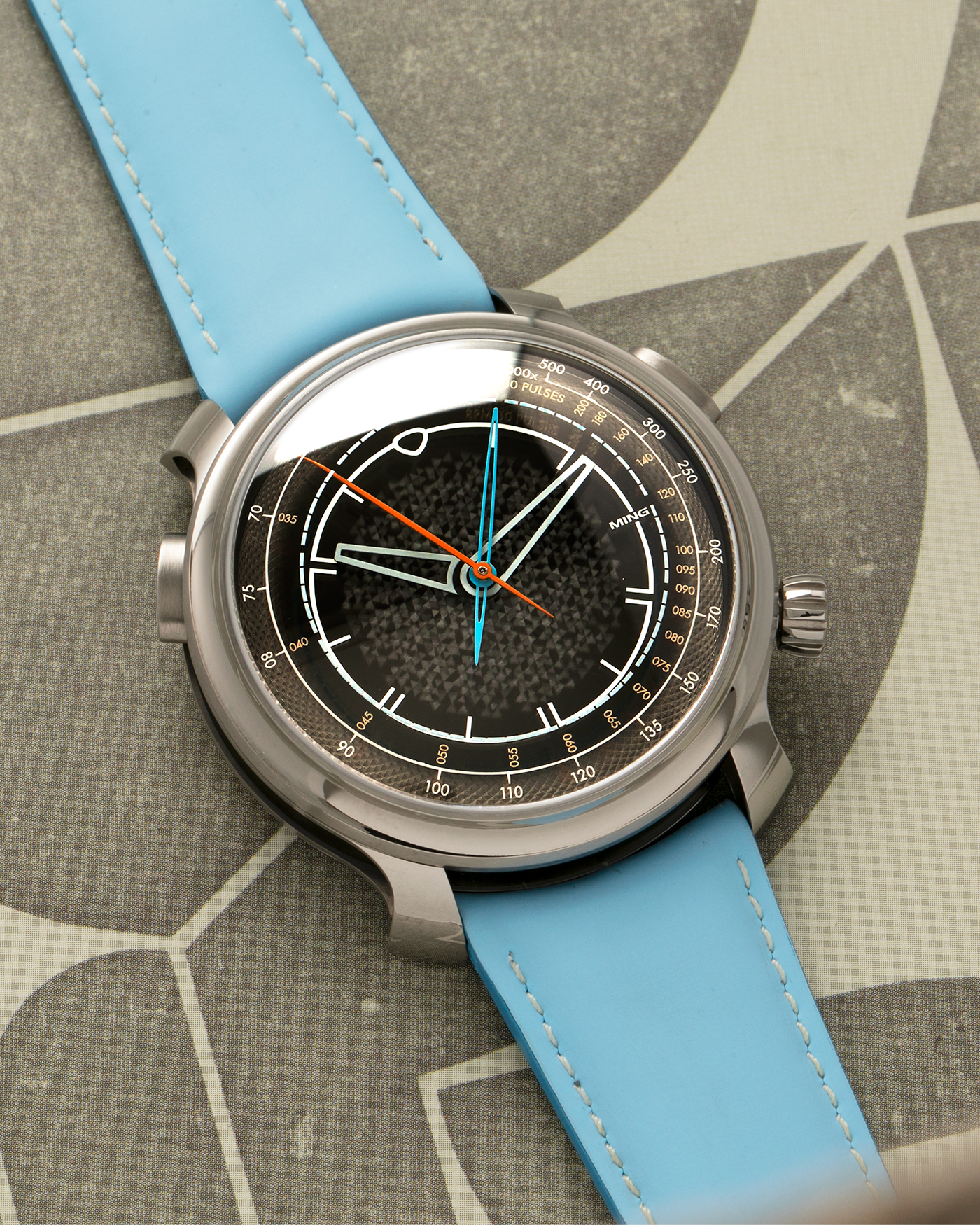 Brand: MING
Year: 2023
Model: 20.01 Series II ‘Special Projects Cave’, Limited to 50 pieces
Material: Grade 5 Titanium Case, DLC-Coated Case Band, Grade 2 Titanium Dial Base
Movement: Agenhor for MING Agengraphe Cal. 6361.M1, Manual-Winding
Case Dimensions: 41.5mm x 14.2mm (Lug-to-Lug 46mm)
Lug Width: 22mm
Strap: Jean Rousseau Sky Blue Calf Leather Strap for MING with Signed Grade 5 Titanium Keeperless Flying Blade Buckle