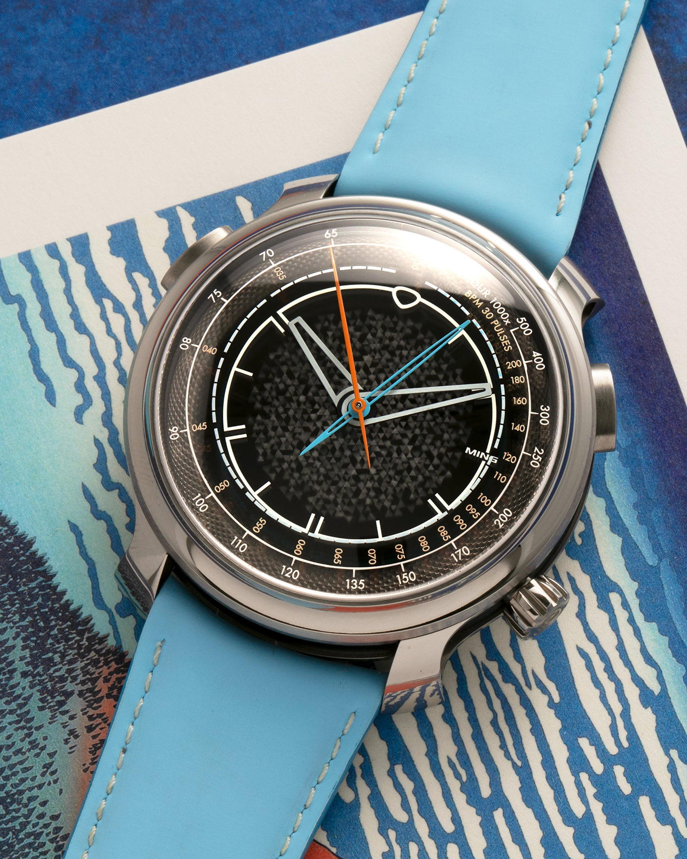 Brand: MING
Year: 2023
Model: 20.01 Series II ‘Special Projects Cave’, Limited to 50 pieces
Material: Grade 5 Titanium Case, DLC-Coated Case Band, Grade 2 Titanium Dial Base
Movement: Agenhor for MING Agengraphe Cal. 6361.M1, Manual-Winding
Case Dimensions: 41.5mm x 14.2mm (Lug-to-Lug 46mm)
Lug Width: 22mm
Strap: Jean Rousseau Sky Blue Calf Leather Strap for MING with Signed Grade 5 Titanium Keeperless Flying Blade Buckle