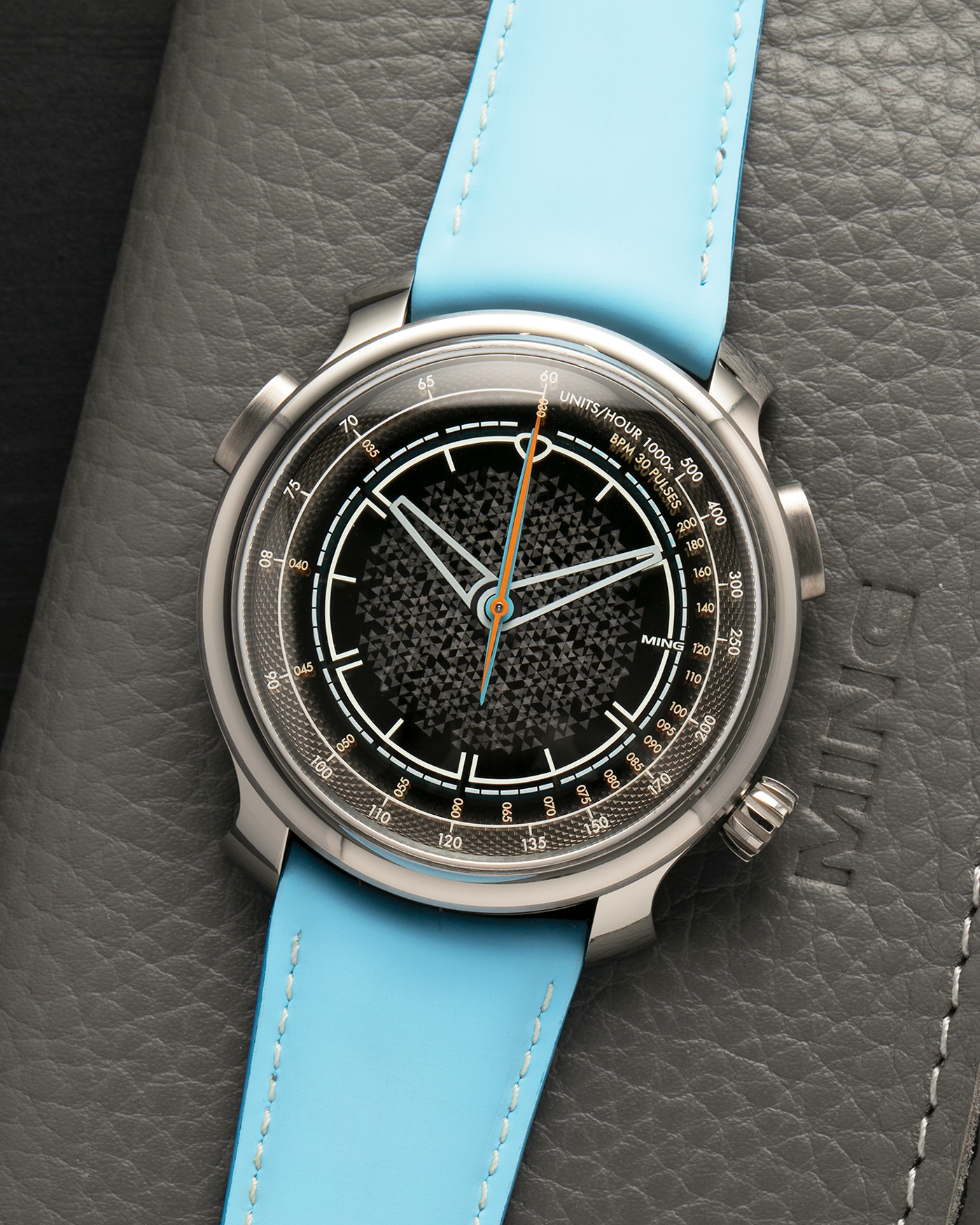 Brand: MING
Year: 2023
Model: 20.01 Series II ‘Special Projects Cave’, Limited to 50 pieces
Material: Grade 5 Titanium Case, DLC-Coated Case Band, Grade 2 Titanium Dial Base
Movement: Agenhor for MING Agengraphe Cal. 6361.M1, Manual-Winding
Case Dimensions: 41.5mm x 14.2mm (Lug-to-Lug 46mm)
Lug Width: 22mm
Strap: Jean Rousseau Sky Blue Calf Leather Strap for MING with Signed Grade 5 Titanium Keeperless Flying Blade Buckle