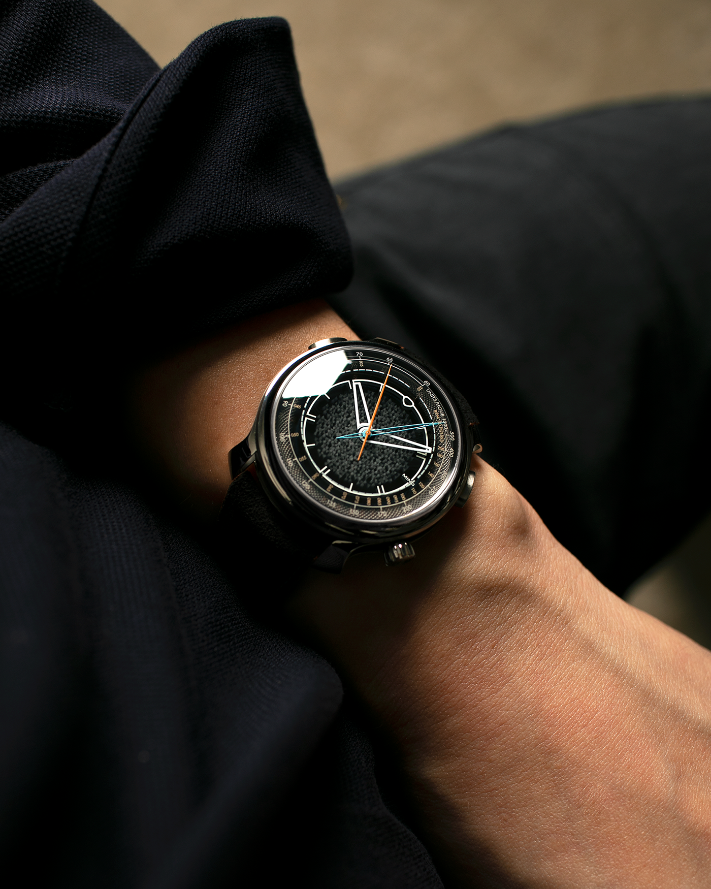 Brand: MING
Year: 2022
Model: 20.01 Series II ‘Special Projects Cave’, Limited to 50 pieces
Material: Grade 5 Titanium Case, DLC-Coated Case Band, Grade 2 Titanium Dial Base
Movement: Agenhor for MING Agengraphe Cal. 6361.M1, Manual-Winding
Case Dimensions: 41.5mm x 14.2mm (Lug-to-Lug 46mm)
Lug Width: 22mm
Strap: Jean Rousseau Black Suede Leather Strap with Orange Underlining for MING with Signed Grade 5 Titanium Keeperless Flying Blade Buckle